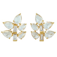 Clous d'oreilles feuille en or 18 carats et diamants