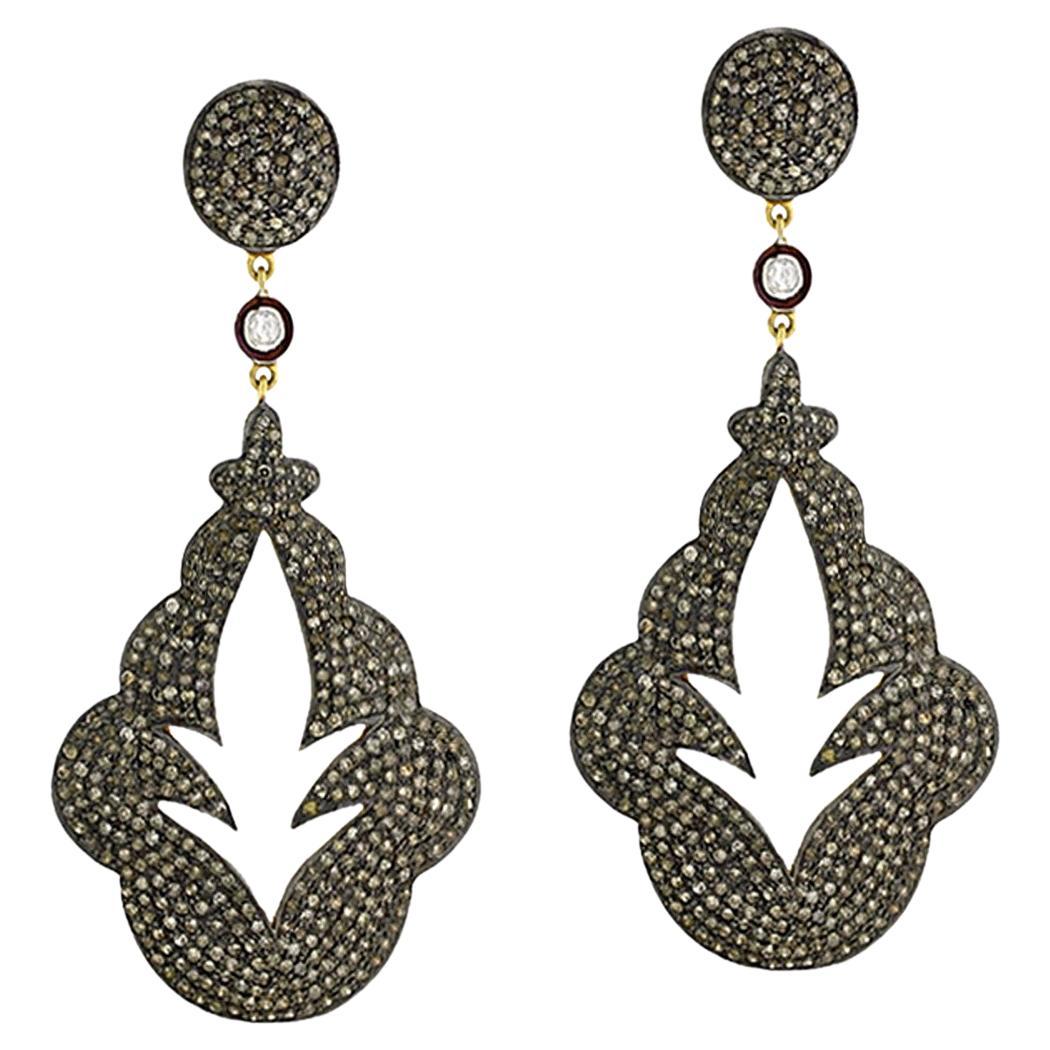 Boucles d'oreilles pendantes en or et argent 18k avec diamants pavés en forme de feuilles découpées