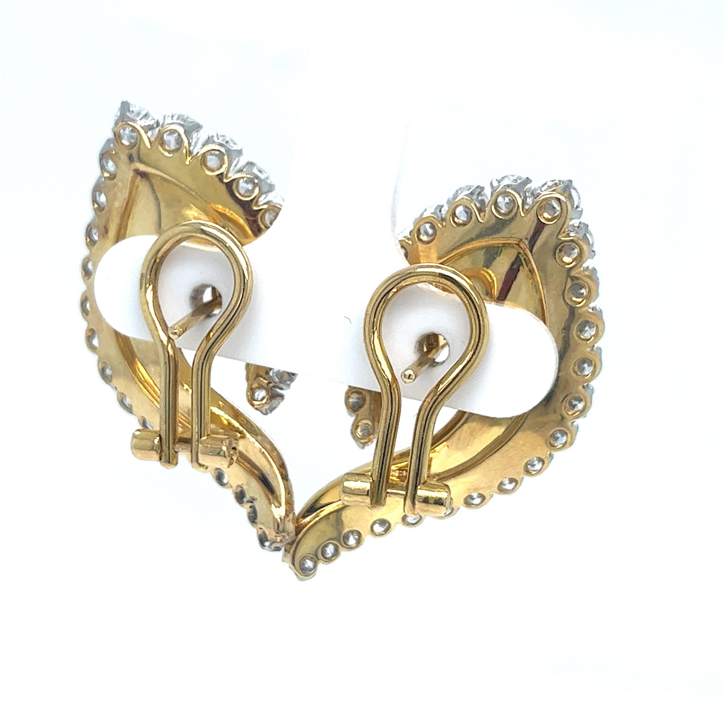 Leaf Design Earrings
 18kt Yellow Gold Wire
26 Natural Full Cut Diamonds 3.08 cts
Polish Excellent
Cut Excellent
Color G
Clarity VVS2
Total Weight 16.30 Grams