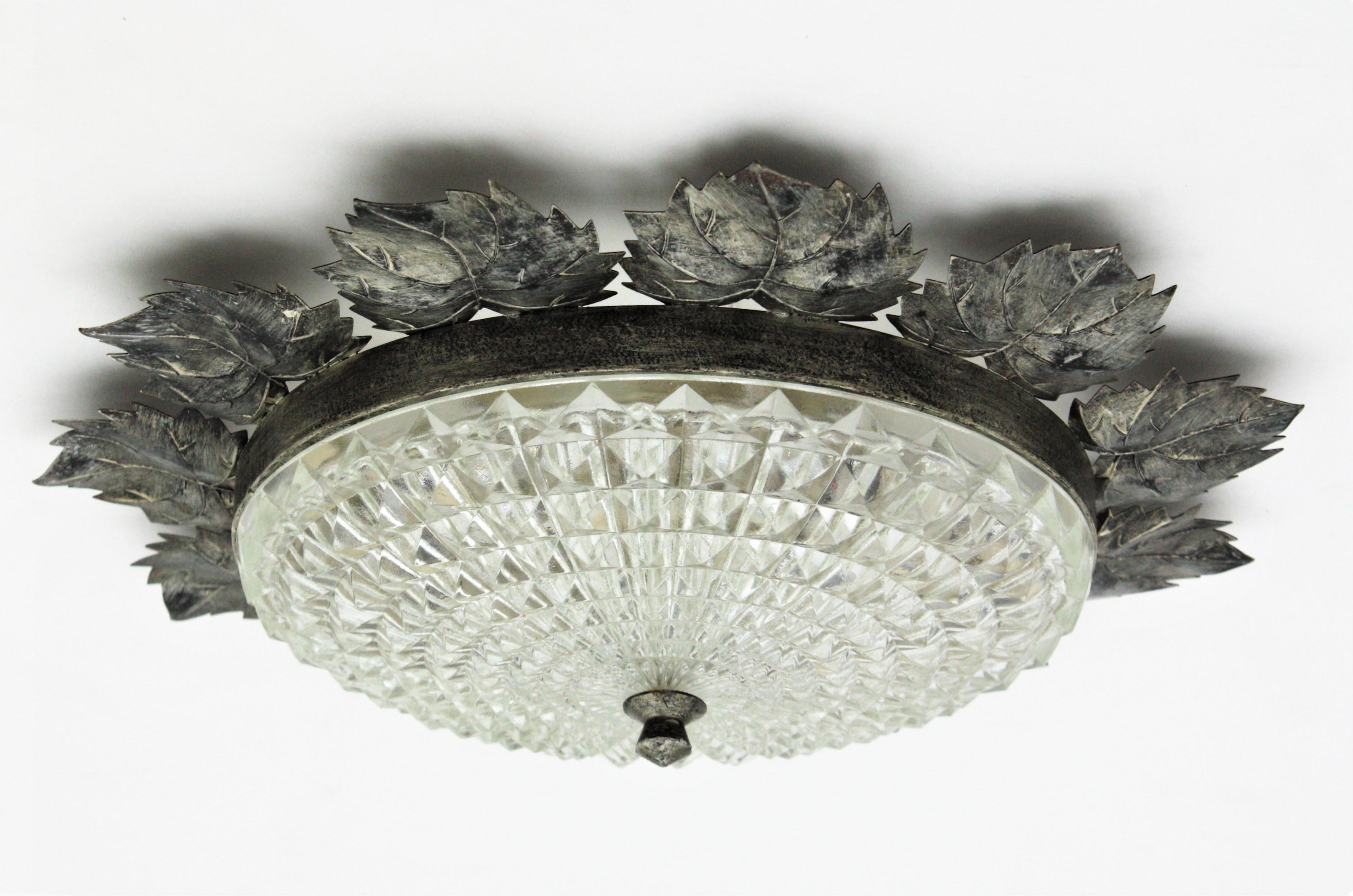 Spanish Sunburst Silver Patinated Iron and Glass Flush Mount Light, Leaves Design For Sale
