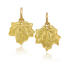 Leaf earrings on hoops in 22K gold