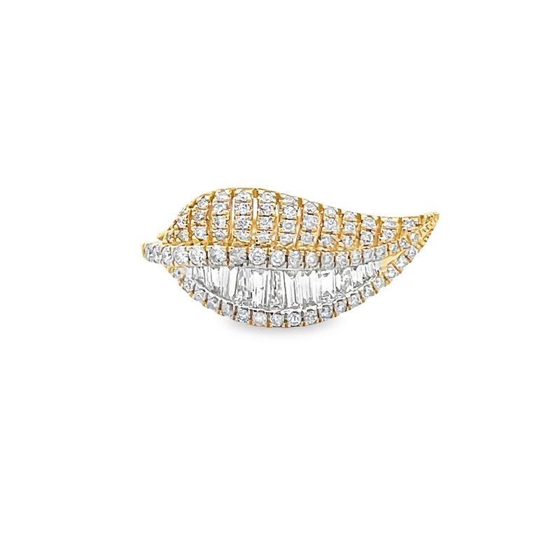 This exquisite fashion ring is a stunning example of masterful artistry and high-quality materials. The ring features a 14K yellow gold band with a beautiful leaf motif that adds a unique and eye-catching element to the design. The band is set with