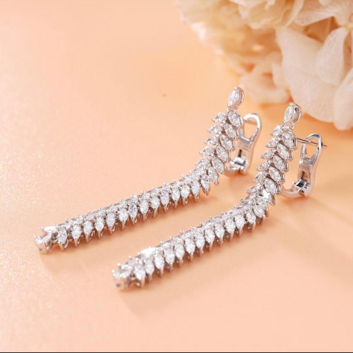 Fine art jewellery dangle earrings.