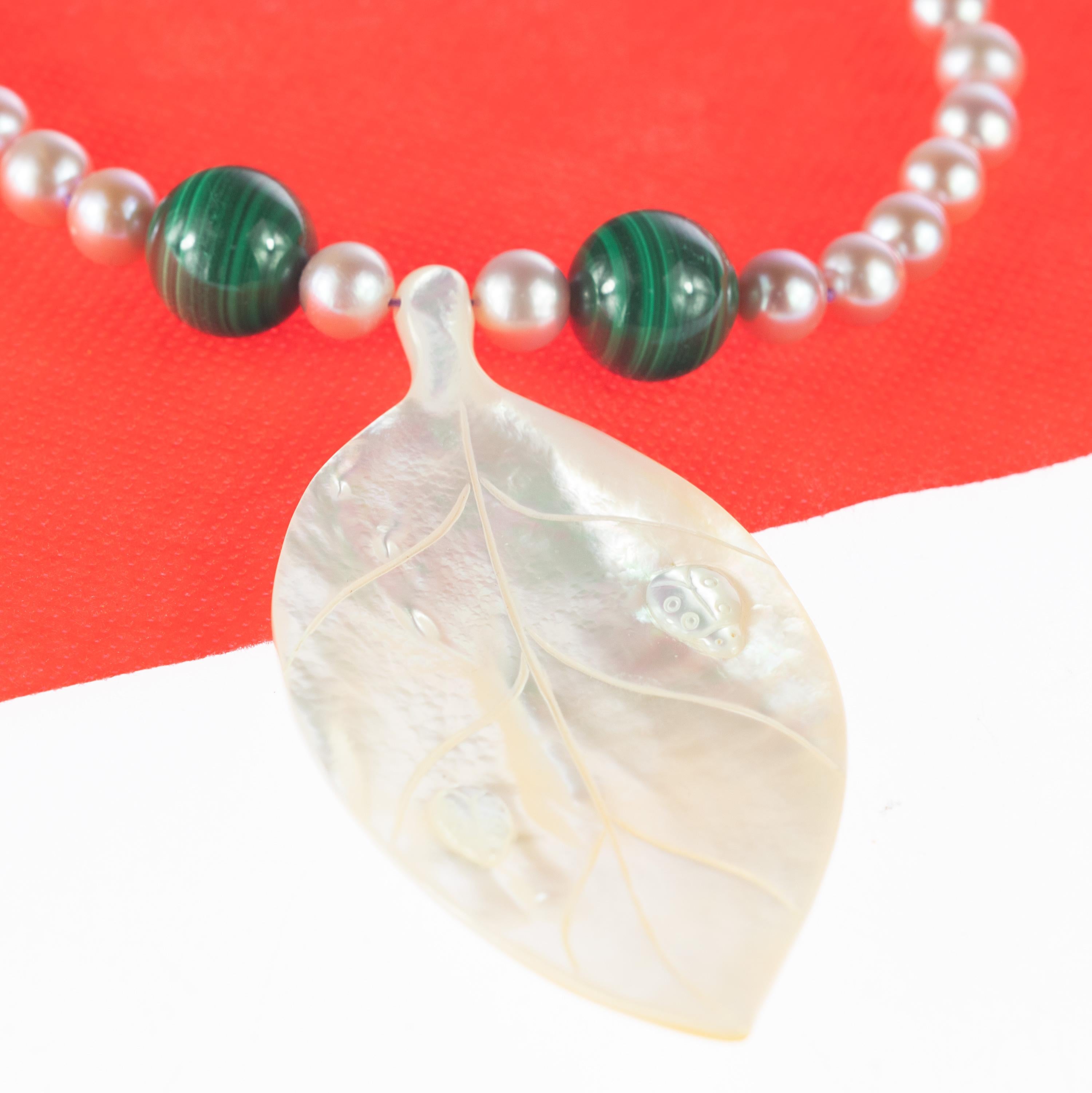 Mixed Cut Leaf Mother of Pearl Malachite Pearl 14 Karat Yellow Gold Tribal Carved Necklace For Sale