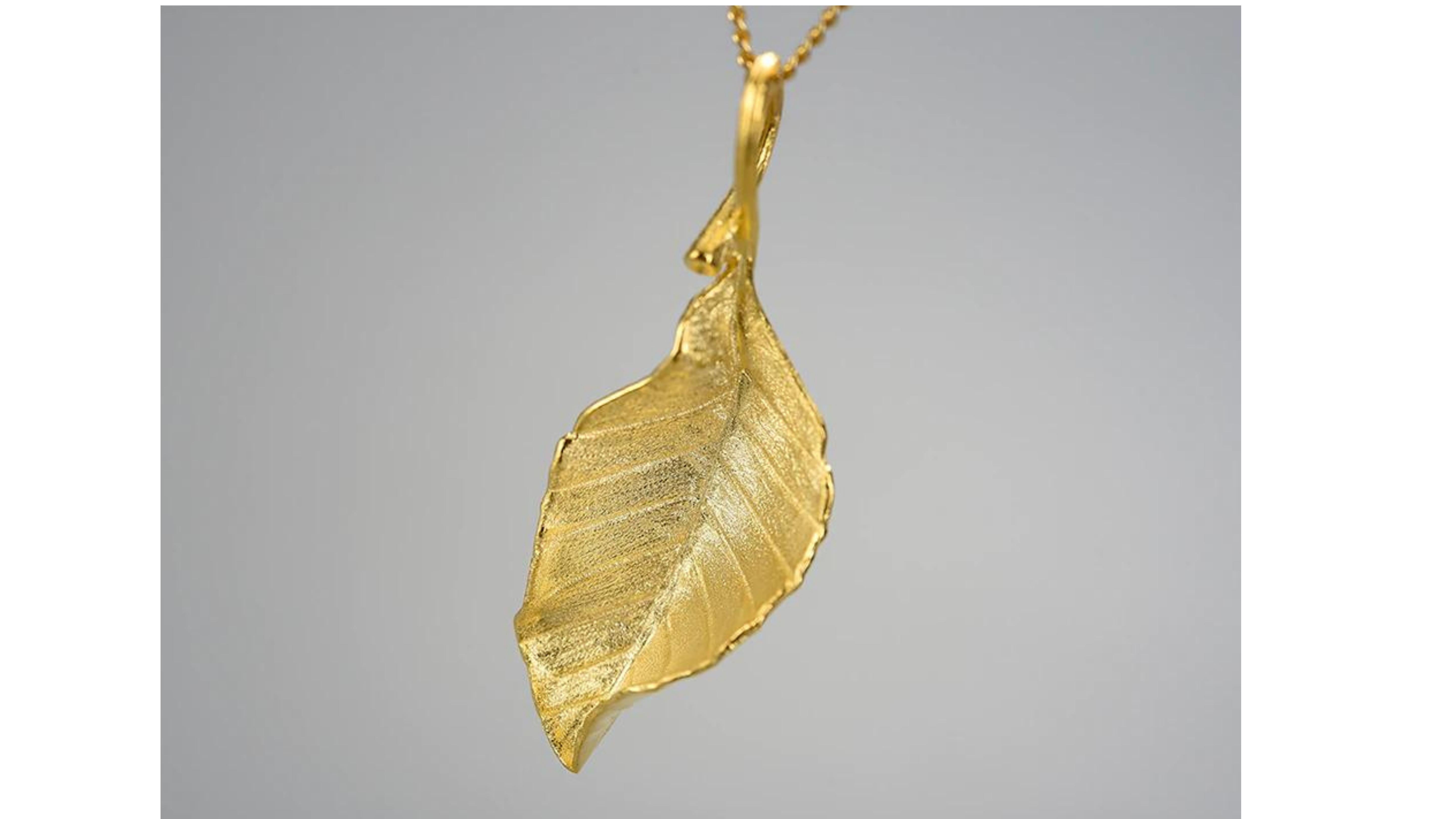 

leaf  Necklace 18  Karat Gold Plated  and can be in Sterling Silver . Make a statement with this Elegant Autumn Leaf necklace and also if you want it in 18k White or Yellow Gold let us know. 
