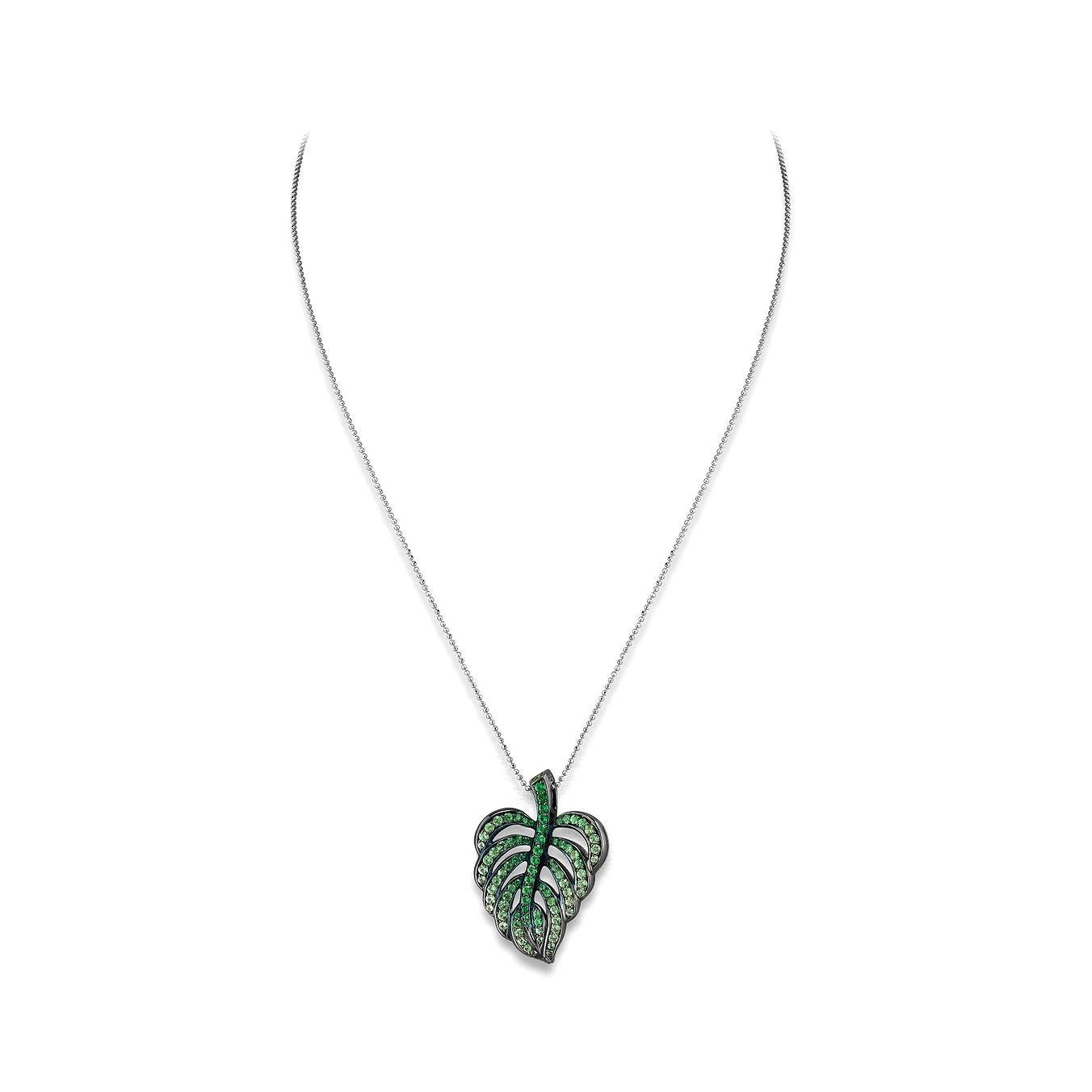 Leaf pendant in 18kt white gold set with 88 green sapphires 2.70 cts