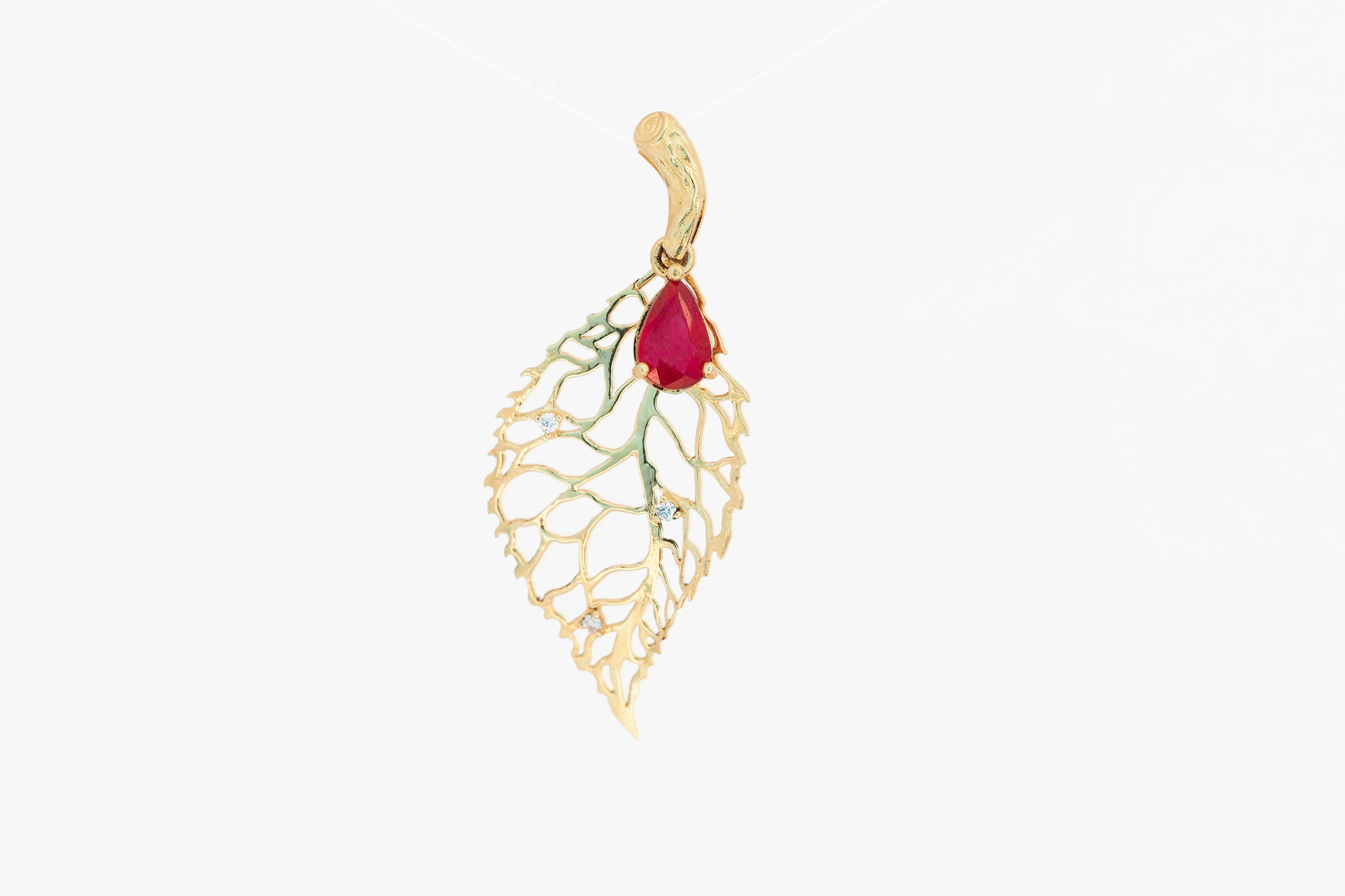 Modern Leaf pendant with ruby and diamonds.  For Sale