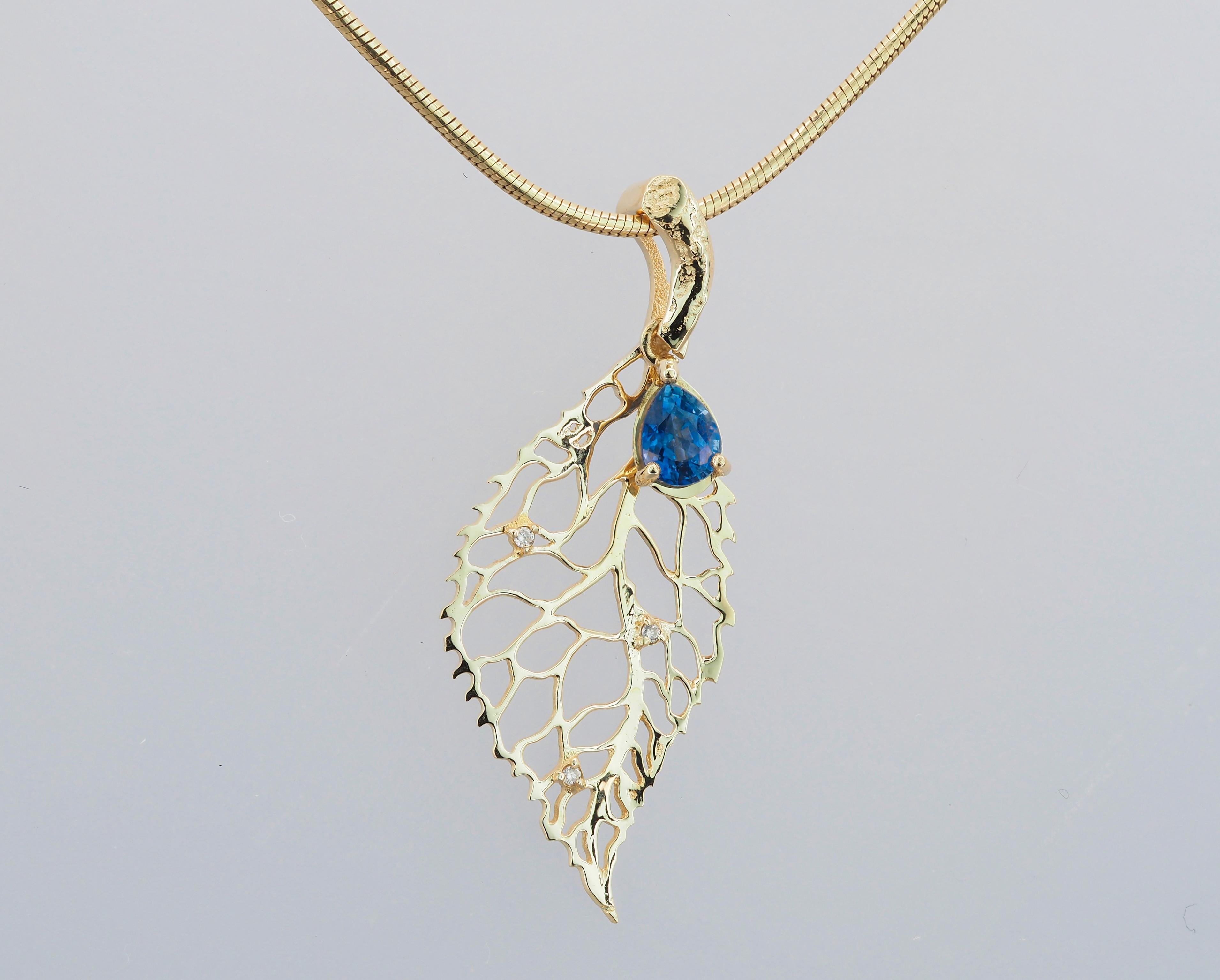 Modern Leaf pendant with sapphire, diamonds.  For Sale