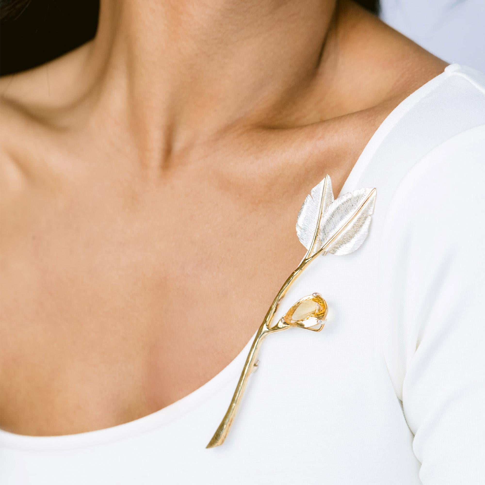 Intention: Appreciate the Little Things

Design: With attention paid to even the smallest details, the beautifully textured leaves and vermeil stem with citrine accent make a simple, fluid shape, stunning.

Style Suggestion: Wear high on the