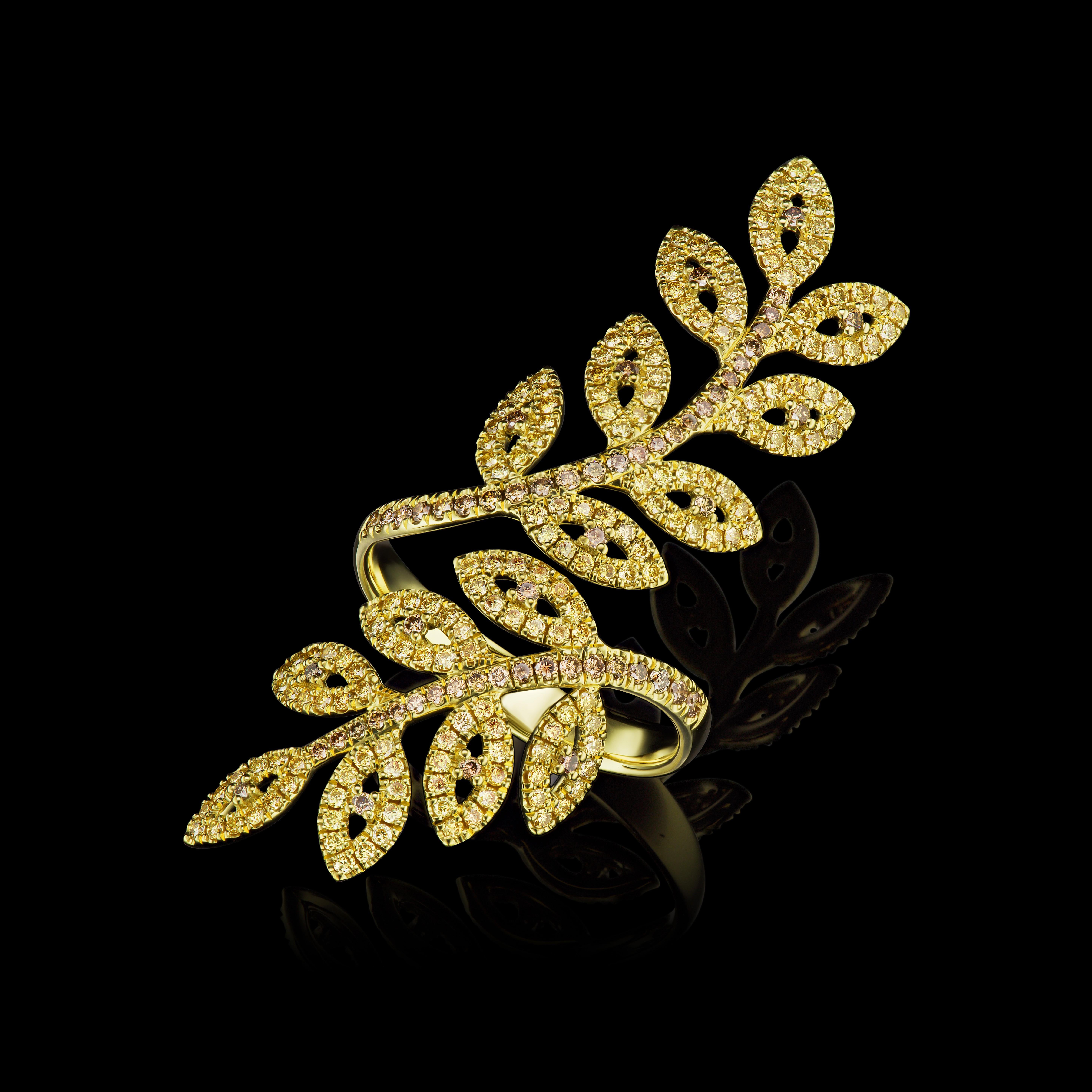 This gorgeous Leaf Ring design is comprised 238 Yellow Diamonds and has a total weight of 1.65 carats all set in 18K yellow Gold! 

