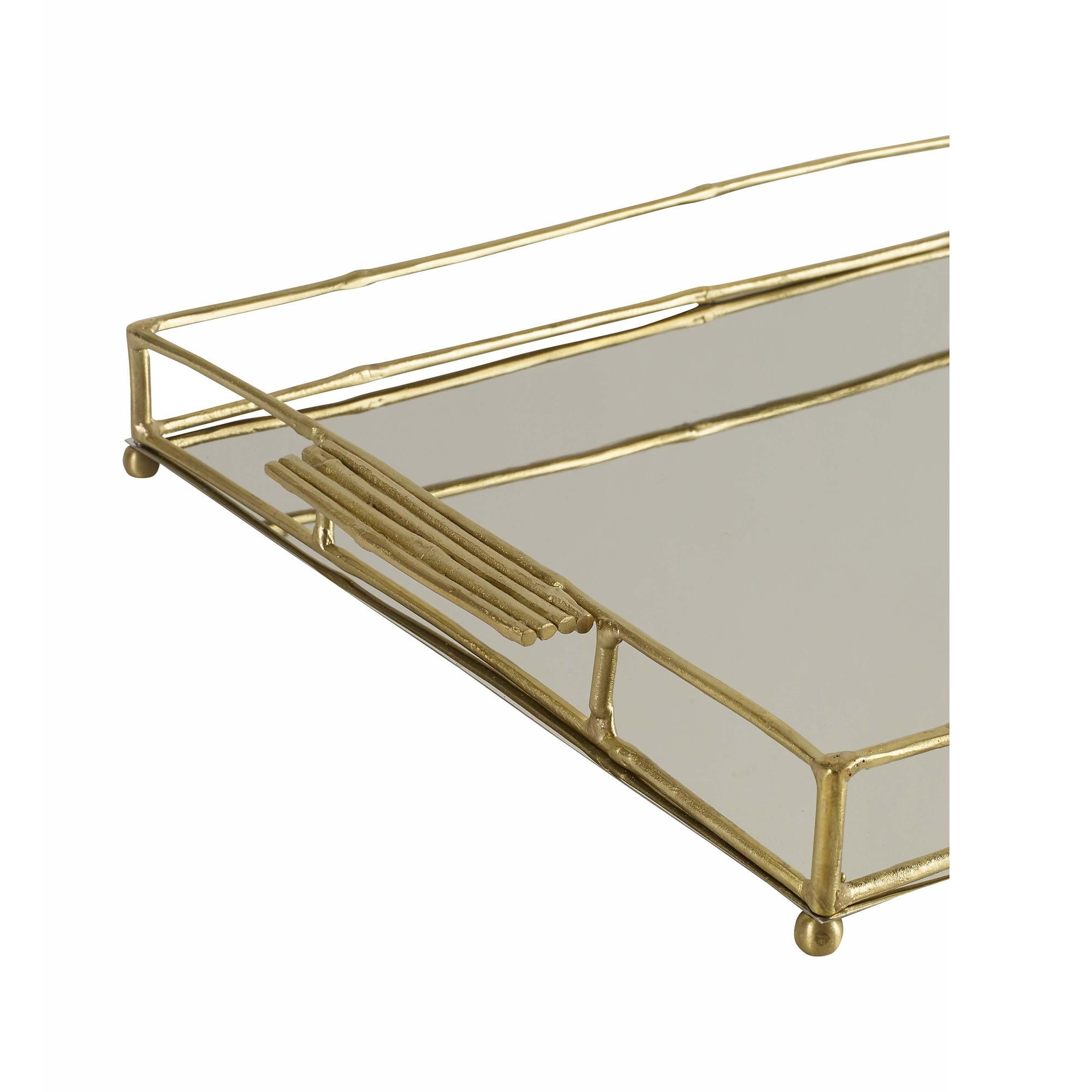 A handmade tray made of brass and stainless steel. The brass sides of the tray are casted to resemble bamboo.
 