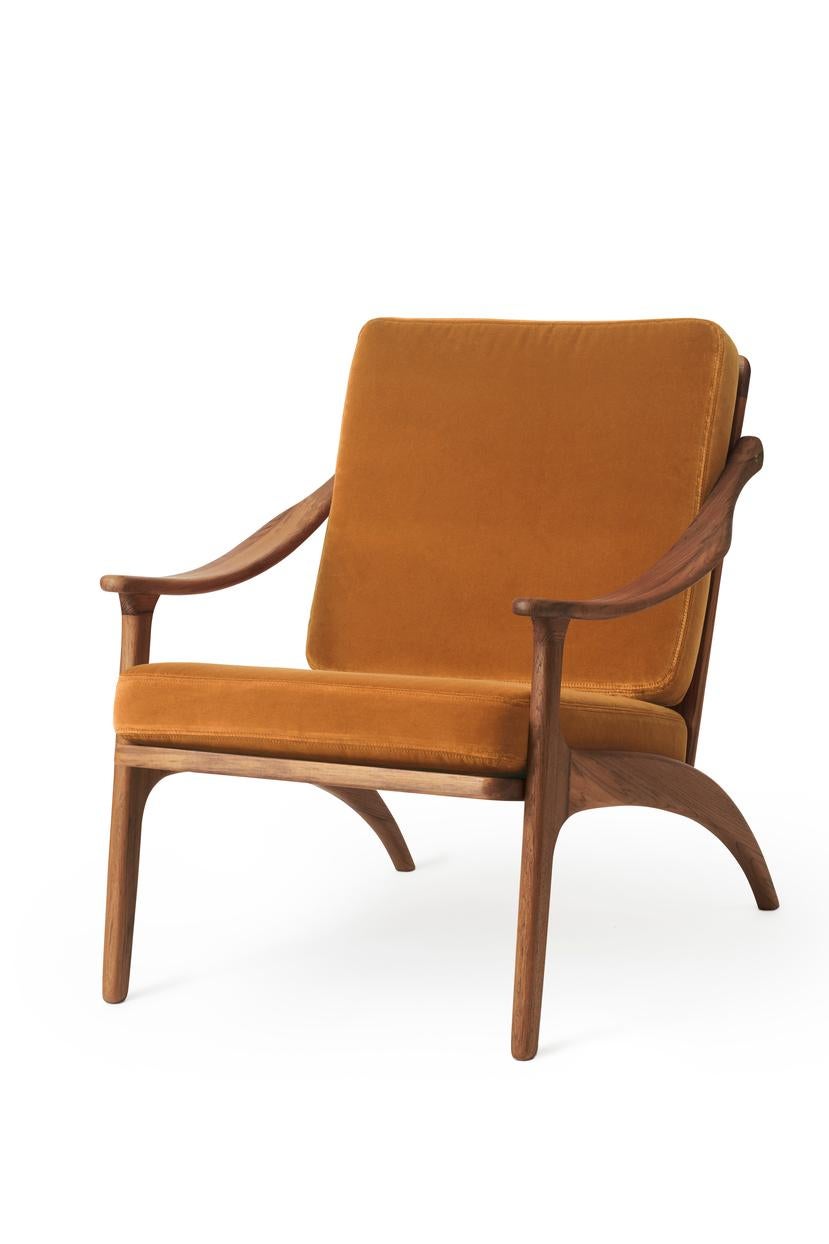 Lean back lounge chair teak Amber by Warm Nordic
Dimensions: D68 x W78 x H 78 cm
Material: Solid Teak, Foam, Textile upholstery
Weight: 9 kg
Also available in different colours, materials and finishes.

Lean Back is an elegant, reclining