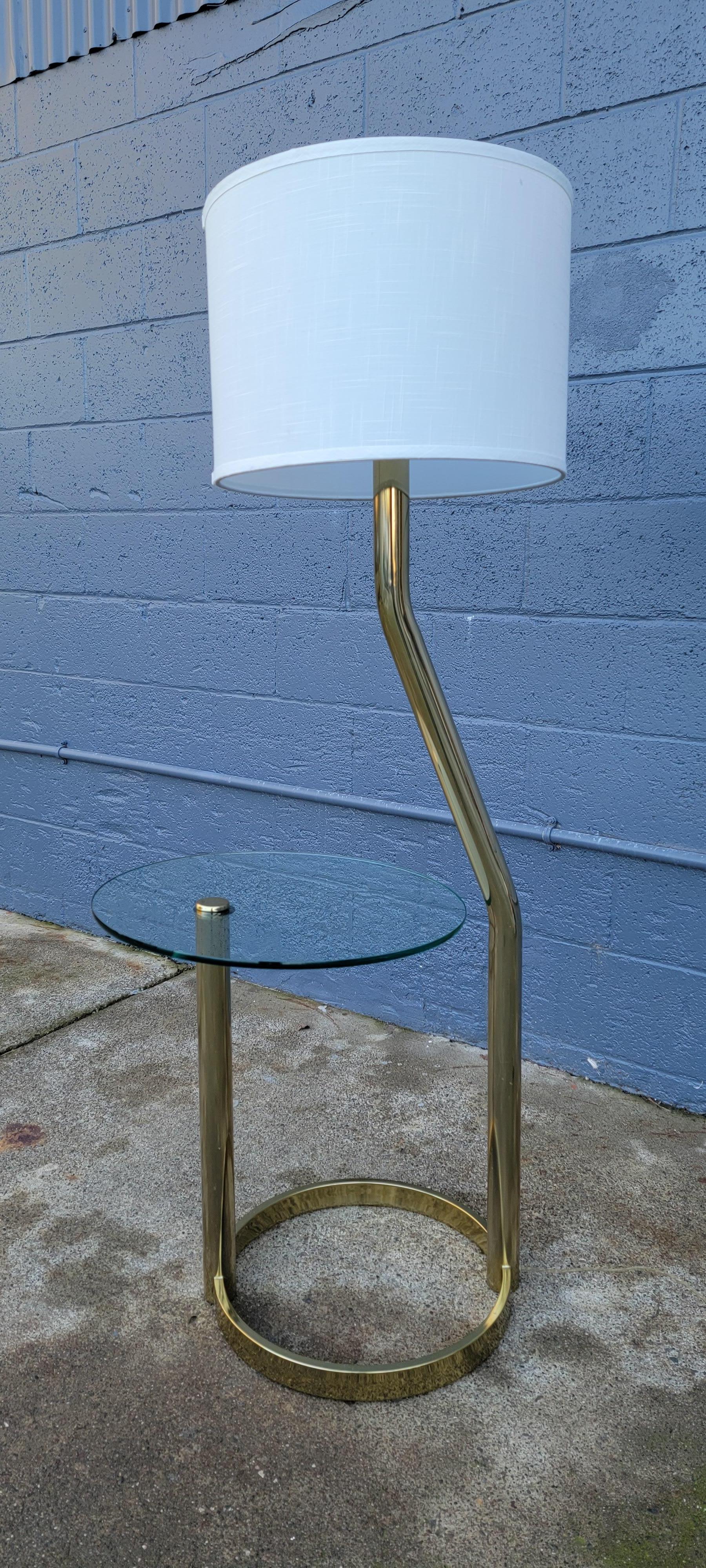 Tubular brass and glass floor lamp by Leon Rosen for Pace Collection. Very good original condition. Glass table top measures 18.5