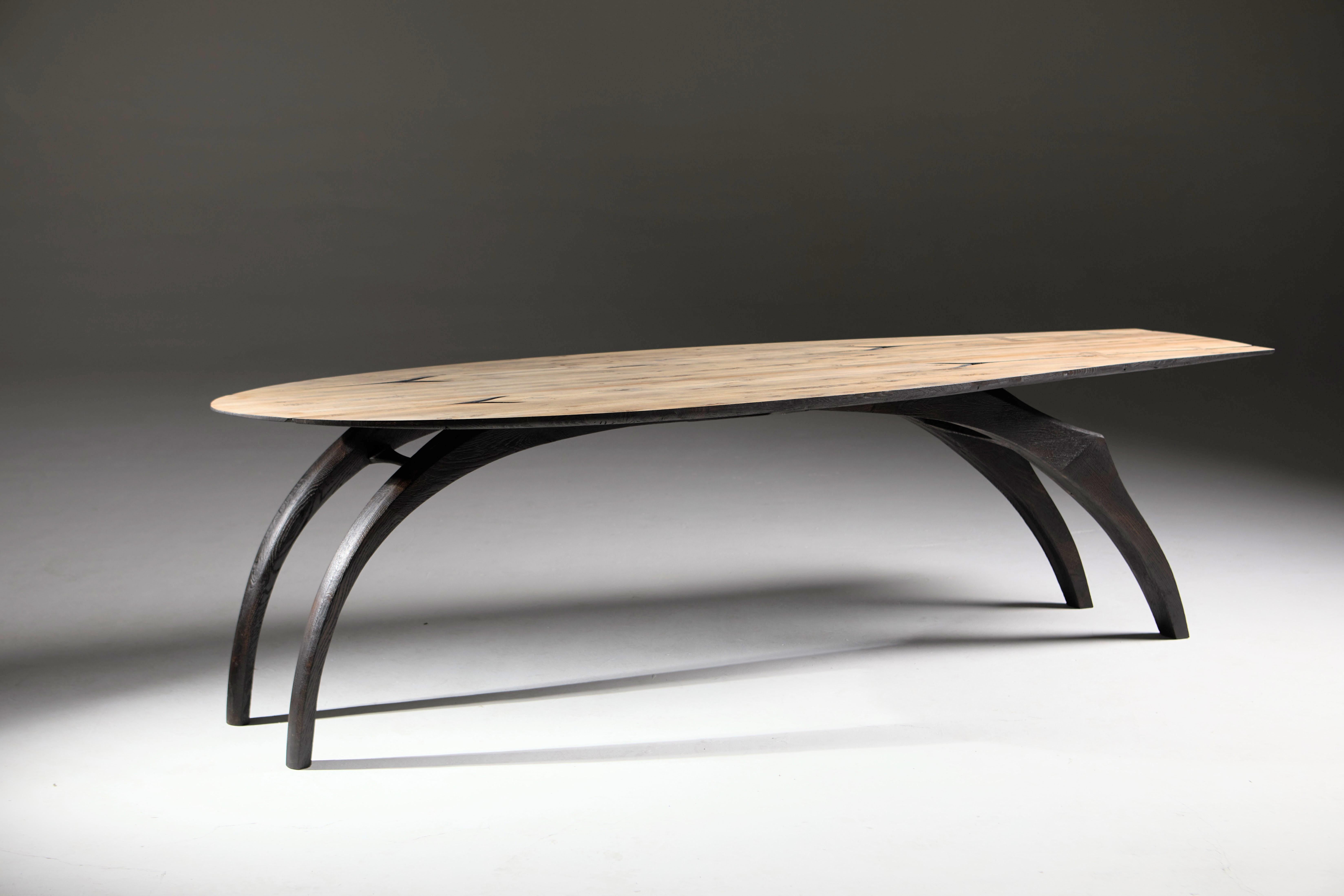 The Leap table:
I wanted to create a table that suggested the fluid figure of an animal in motion.
– Made from solid pippy English oak.
– The legs are flame-scorched and brushed to enhance the grain.
– The legs and underside of the tabletop are