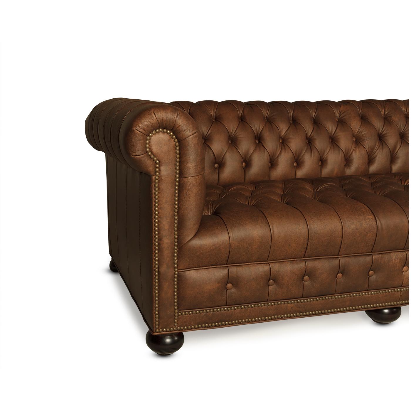 A classic long leather 4 seater Chesterfield sofa. The unusual long tufted chesterfield sofa is ideal for a long entry hall, living room, a hotel lobby, or a public waiting area. Covered in a 