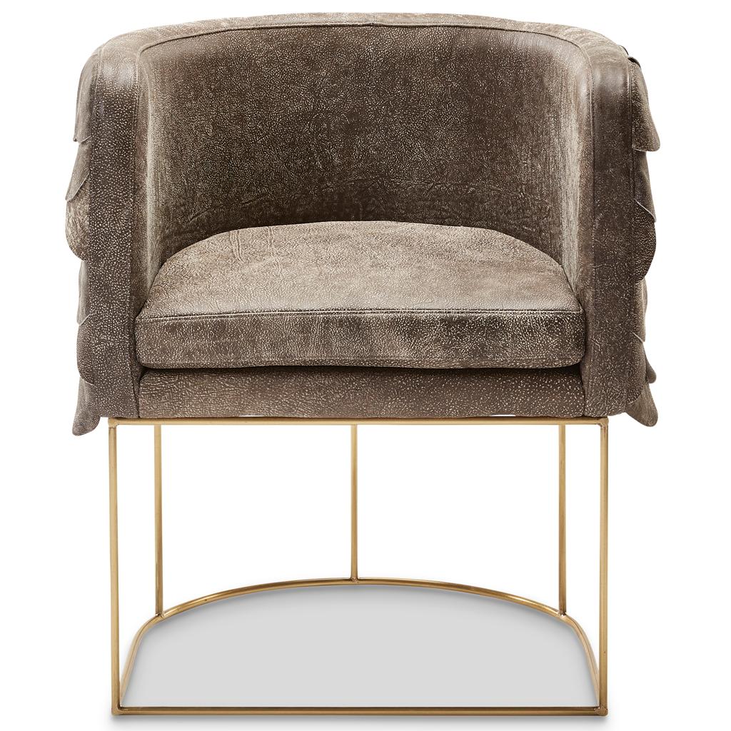Inspired by the South African birds of prey, this contemporary and handmade tub chair, by Egg Designs, is clad in a series of distressed leather circles, each one hand pinned to create an overlapping pattern reminiscent of a bird's wing.
The steel