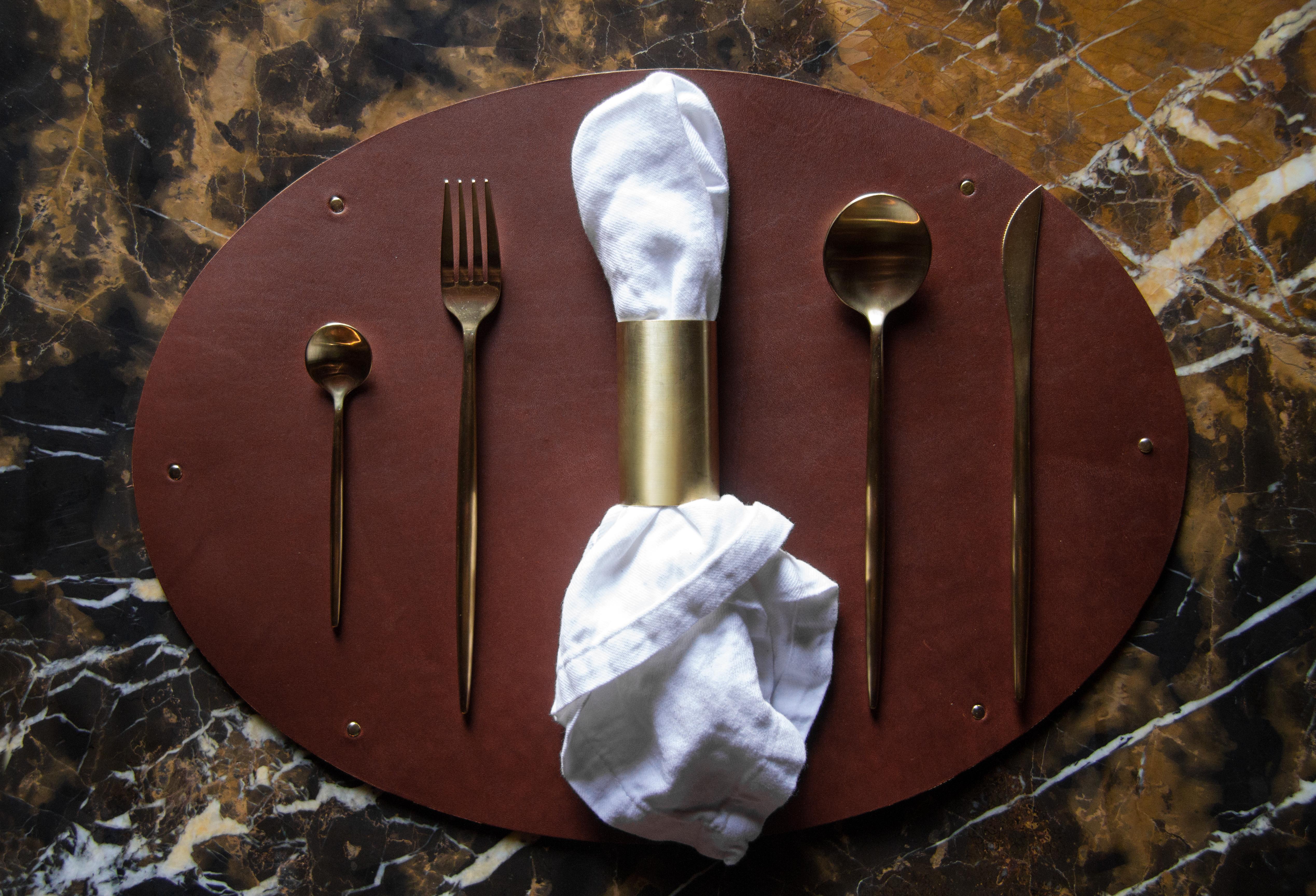 The (wh)ORE HAüS STUDIOS small goods collection was made for those that wanted to experience the (wh)ORE HAüS brand without committing to our larger pieces. Our leather and brass placemat set is made of leather with brass accents. It pairs great