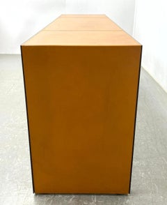 Table console postmoderne en cuir et bronze