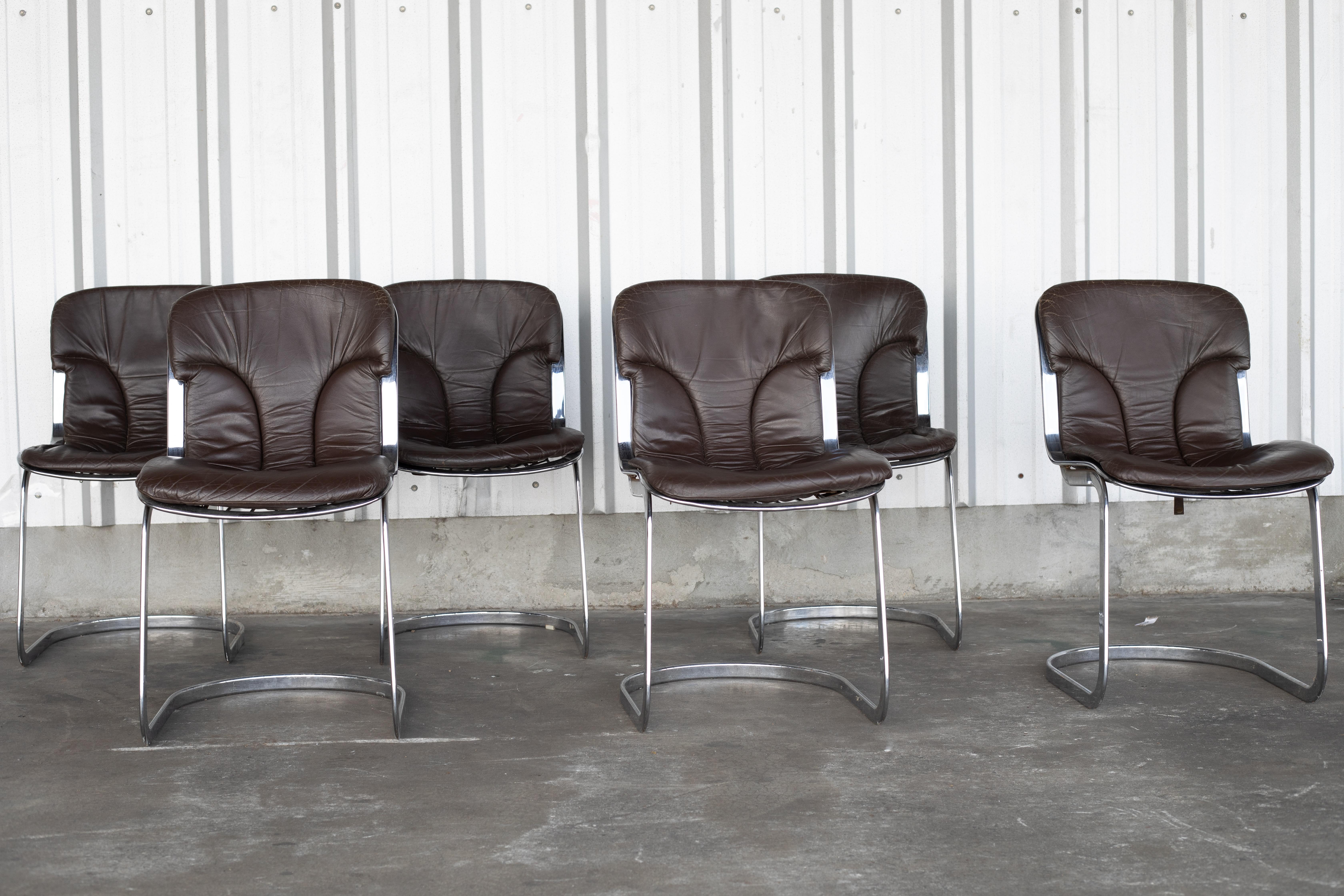 Set of 6 leather and chrome dining chairs in good condition! In the style of Willy Rizzo's dining chairs for Cidue in Italy from the 1970s. Unsure of authenticity, but the age seems to be from around that era. 