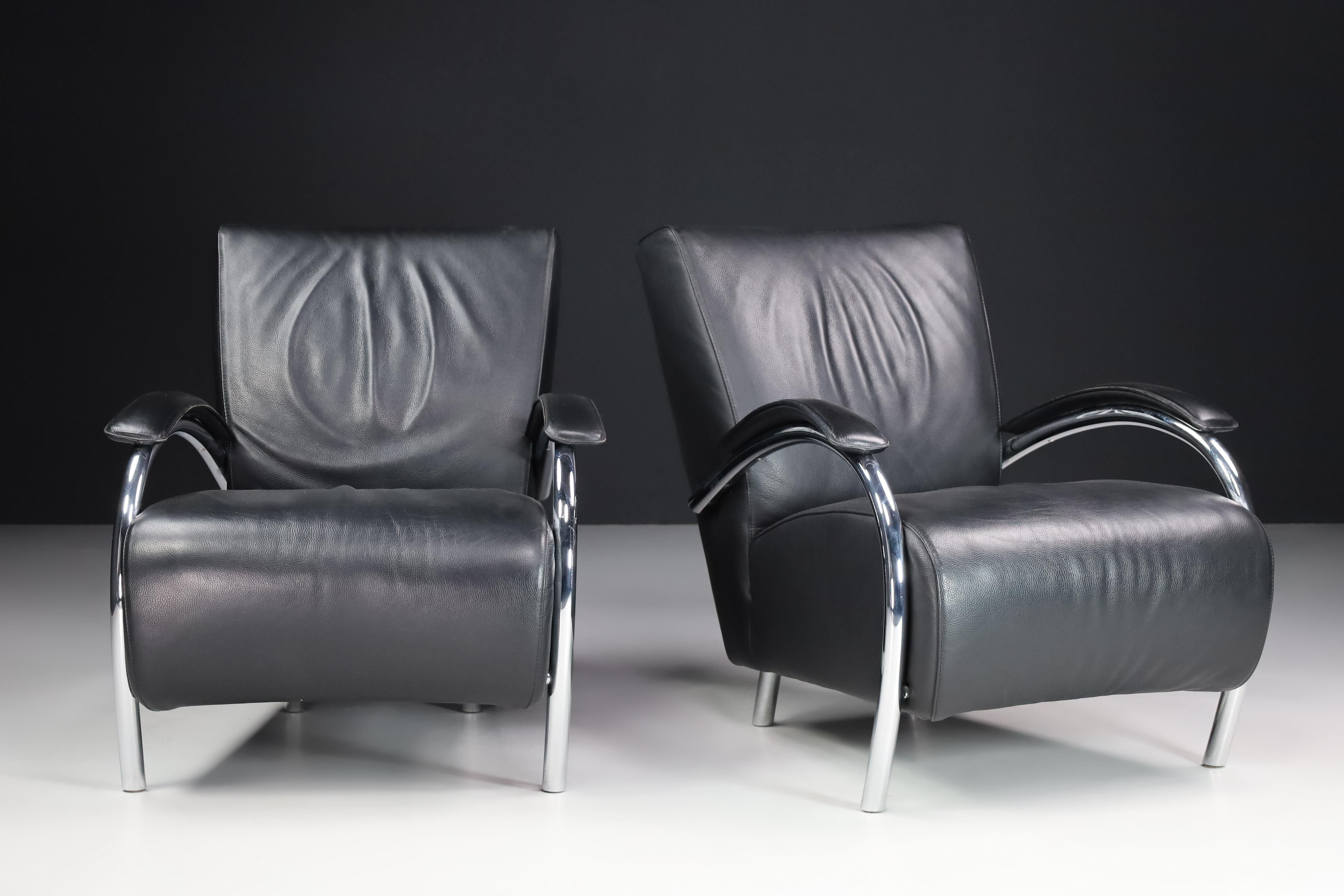 Leather and Chrome Lounge chairs For Molinari, Italy 1980s

These armchairs were designed and produced in the 80s by the Italian furniture manufacturer Molinari, known for its handmade quality furniture. The armchairs are upholstered with thick,