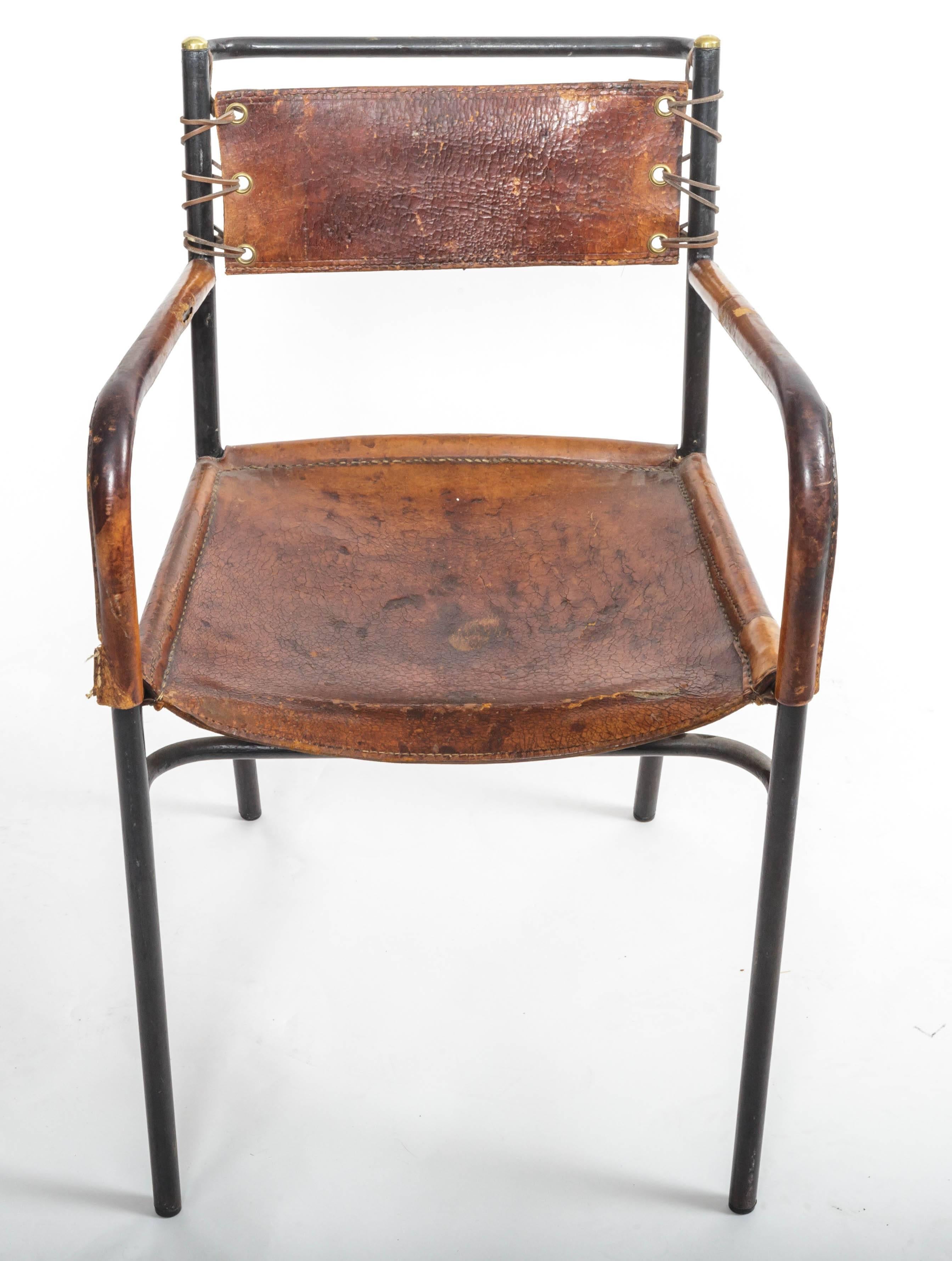Leather and metal armchair.
In the style of Jacques Adnet
France, 1950s.
 