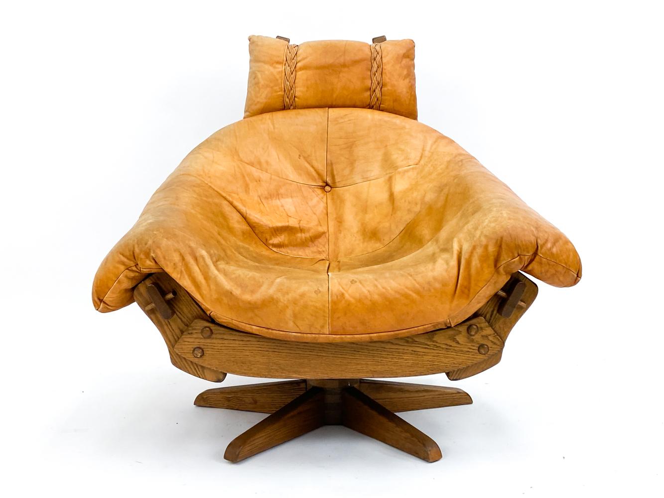 Leather And Oak Easy Chair With Footstool In Style Of Gerard Van Den Berg In Good Condition For Sale In Norwalk, CT