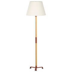Leather and Oak Floor Lamp by Jacques Adnet.
