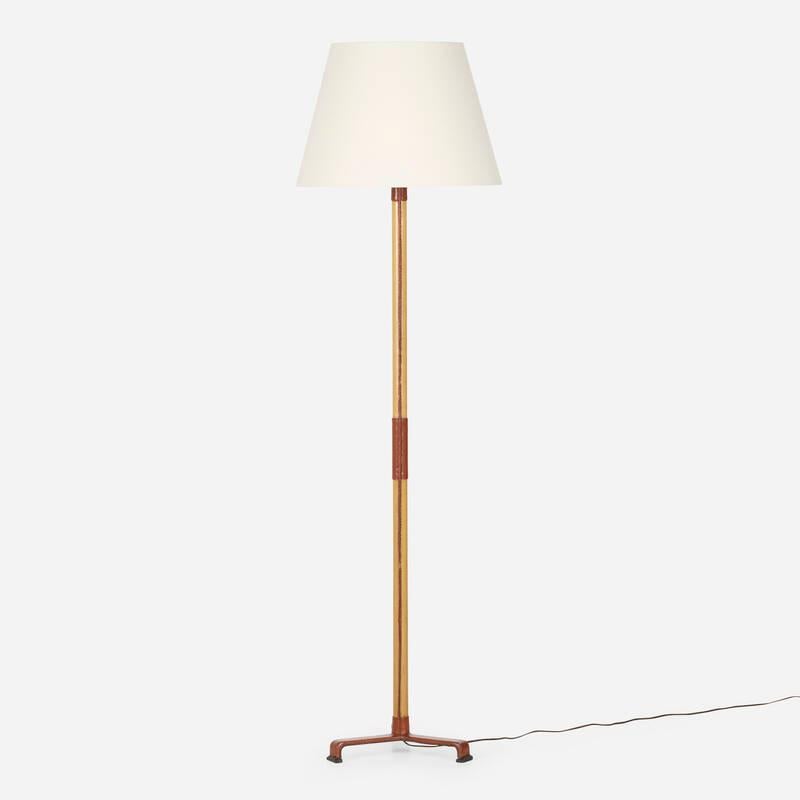 Lámpara de pie de cuero y roble de Jacques Adnet. Francia: hacia 1950 Procedencia: Galería Yves Gastou, París  Colección privada, 