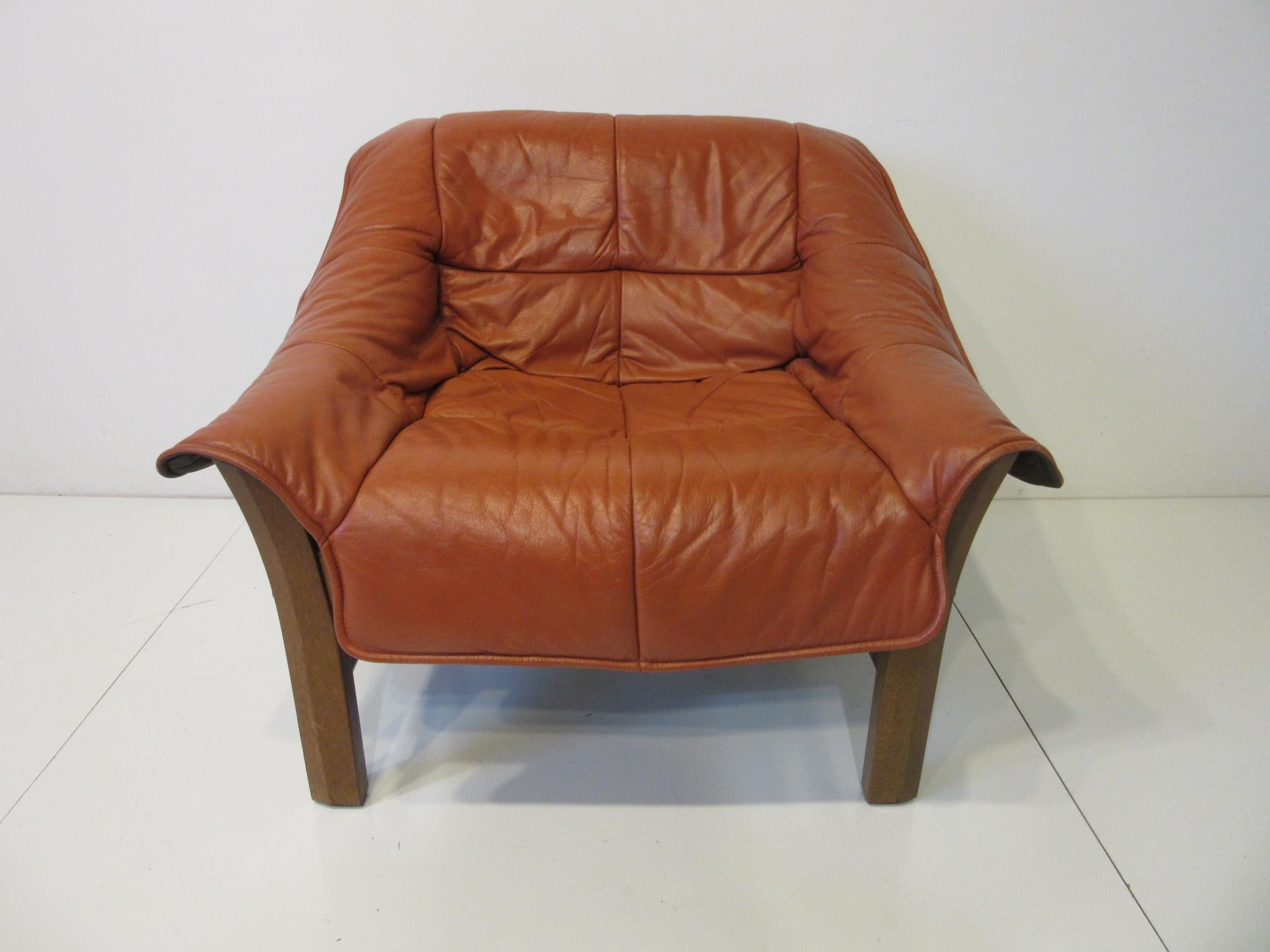 Brazilian Leather and Rosewood Lounge Chair in the style of Lafer, Brazil