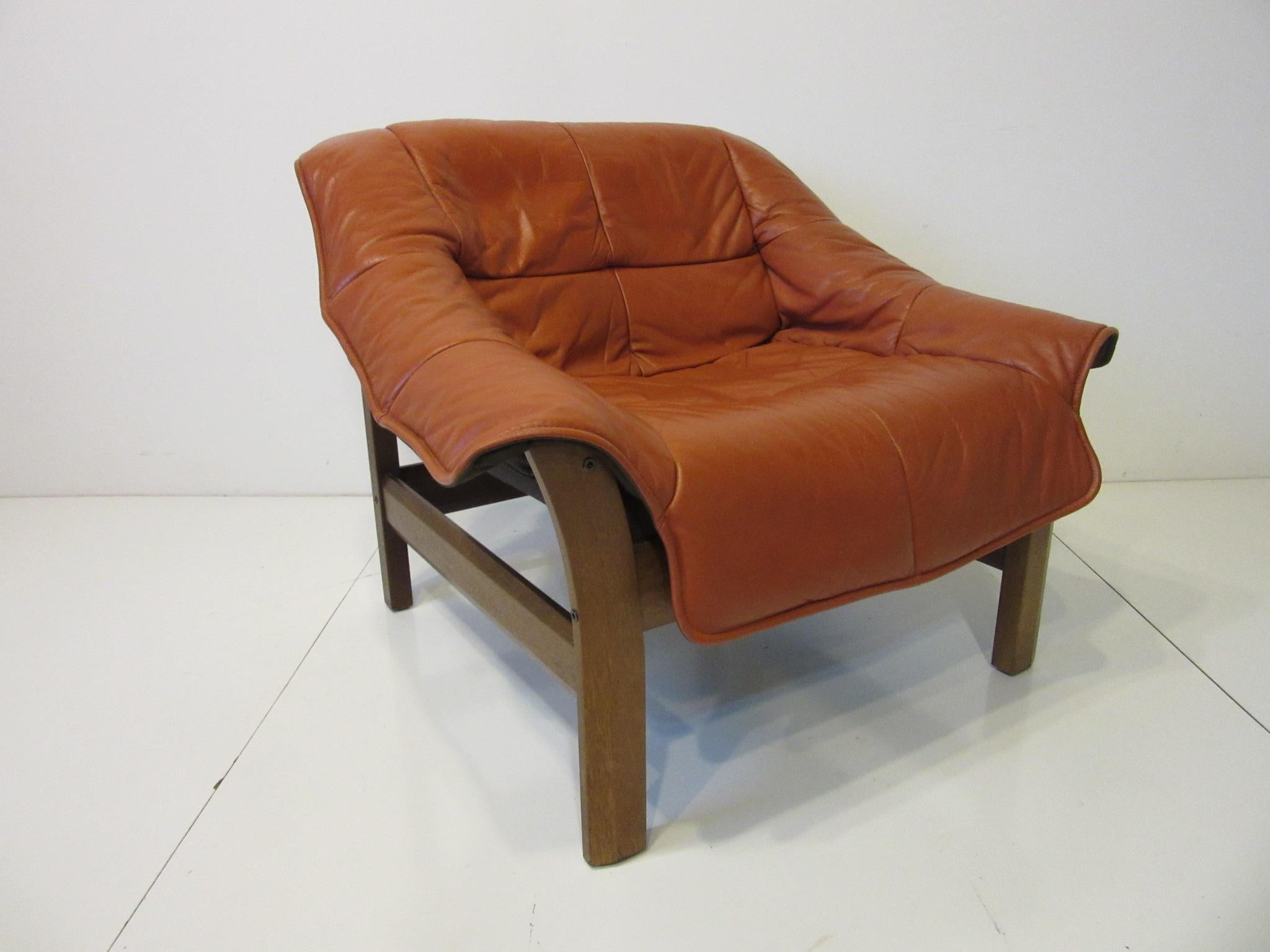Leather and Rosewood Lounge Chair in the style of Lafer, Brazil 1