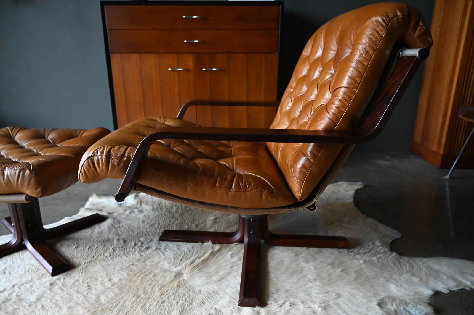 Mid-Century Modern Leather and Rosewood Swivel Lounge Chair and Ottoman by Sigurd Ressell, 1970