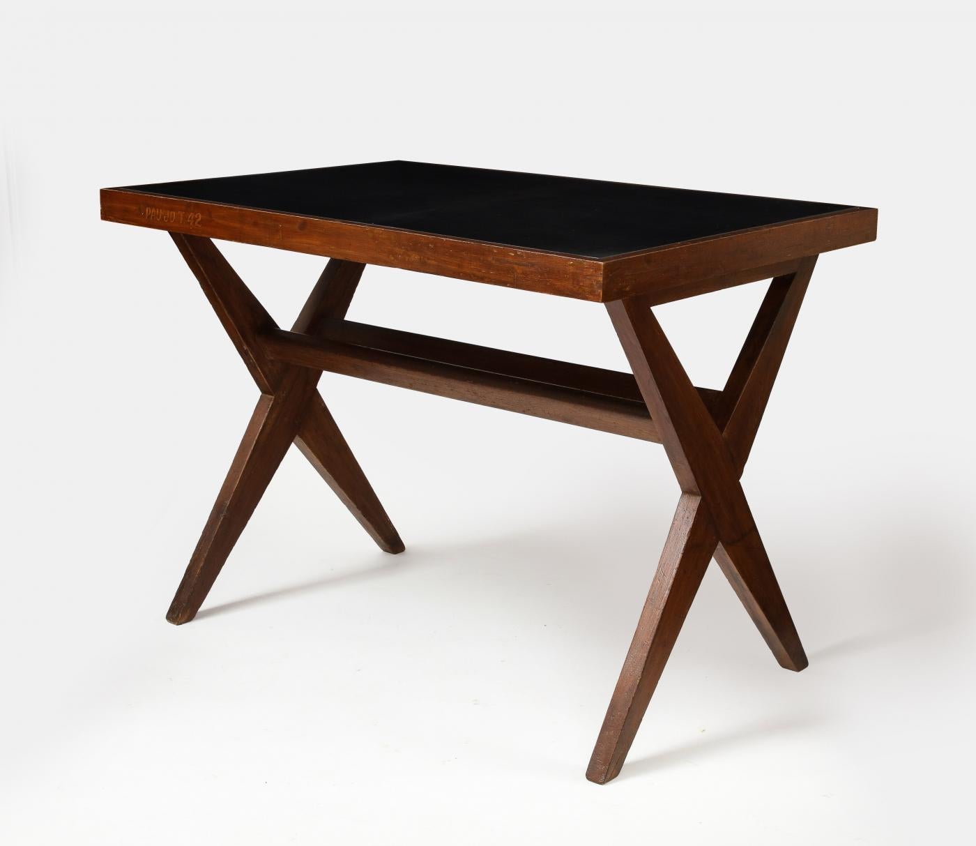 Leather and Teak Desk by Pierre Jeanneret, Chandigarh, India

Beautiful patinated desk by PIerre Jeanneret. The full-grained leather is beautifully dyed and ties seamlessly with the warmth of the teak.

