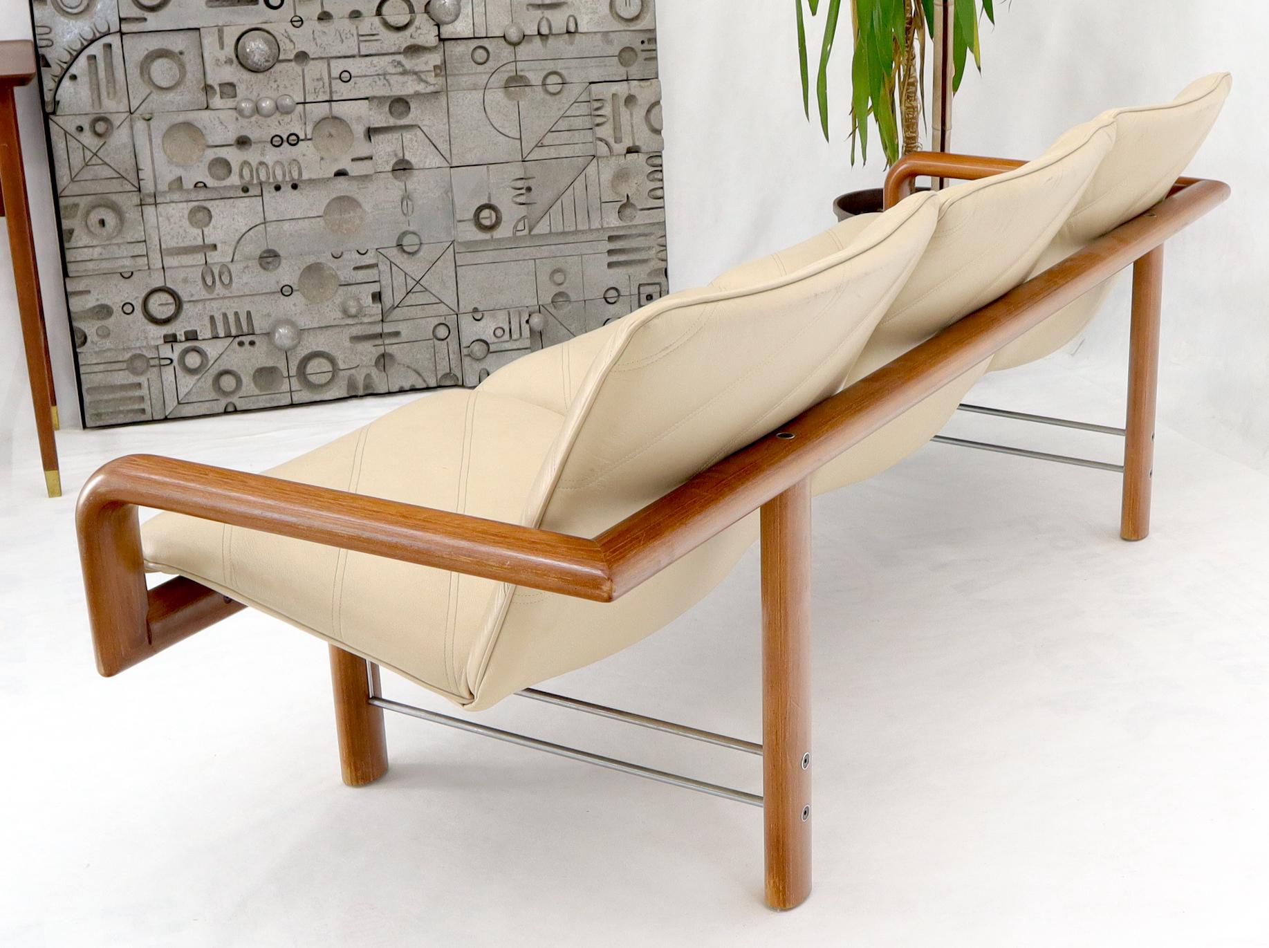 Sharp Danish Mid-Century Modern teak and leather floating low profile sofa.
 