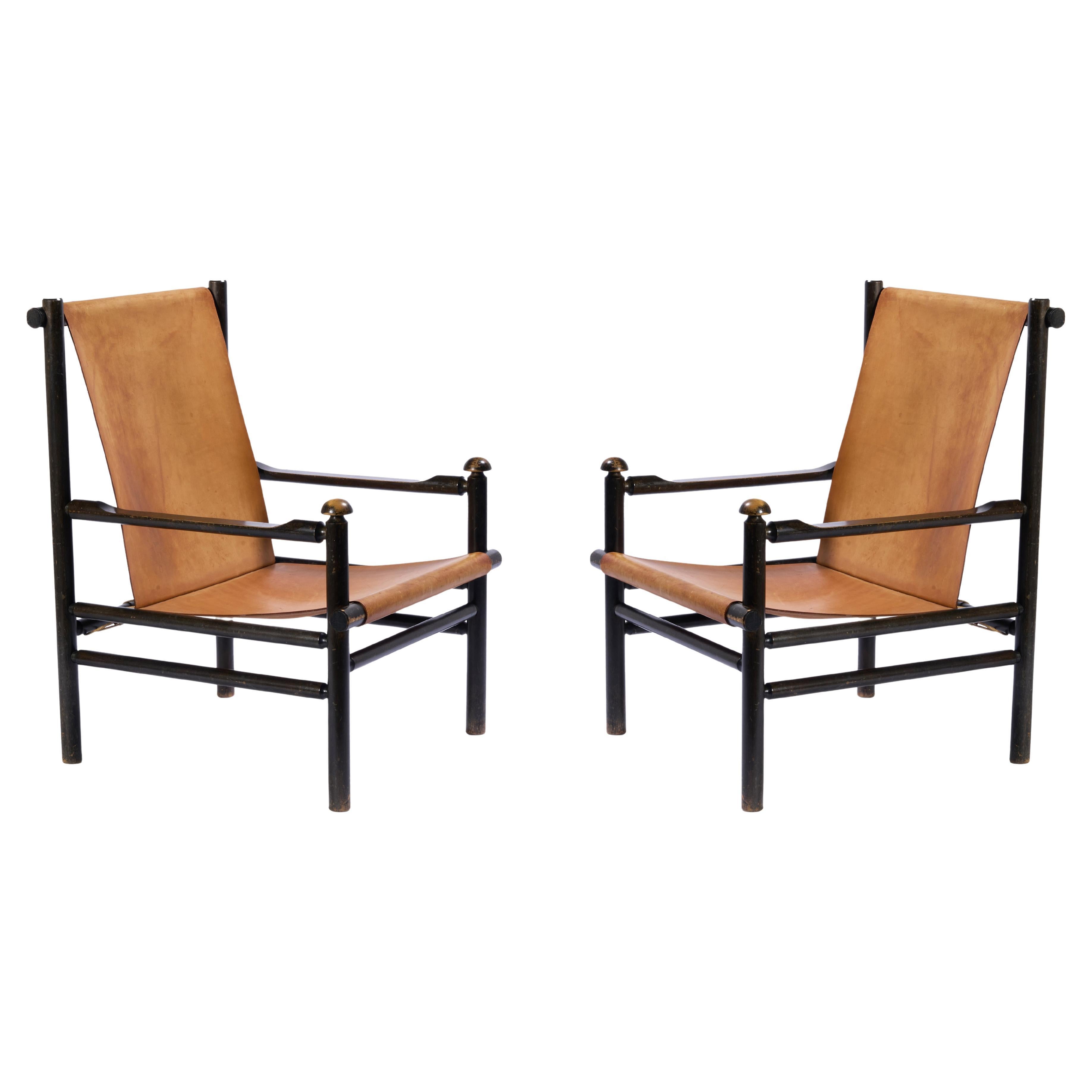 Paire de fauteuils en cuir et Wood, designer hollandais