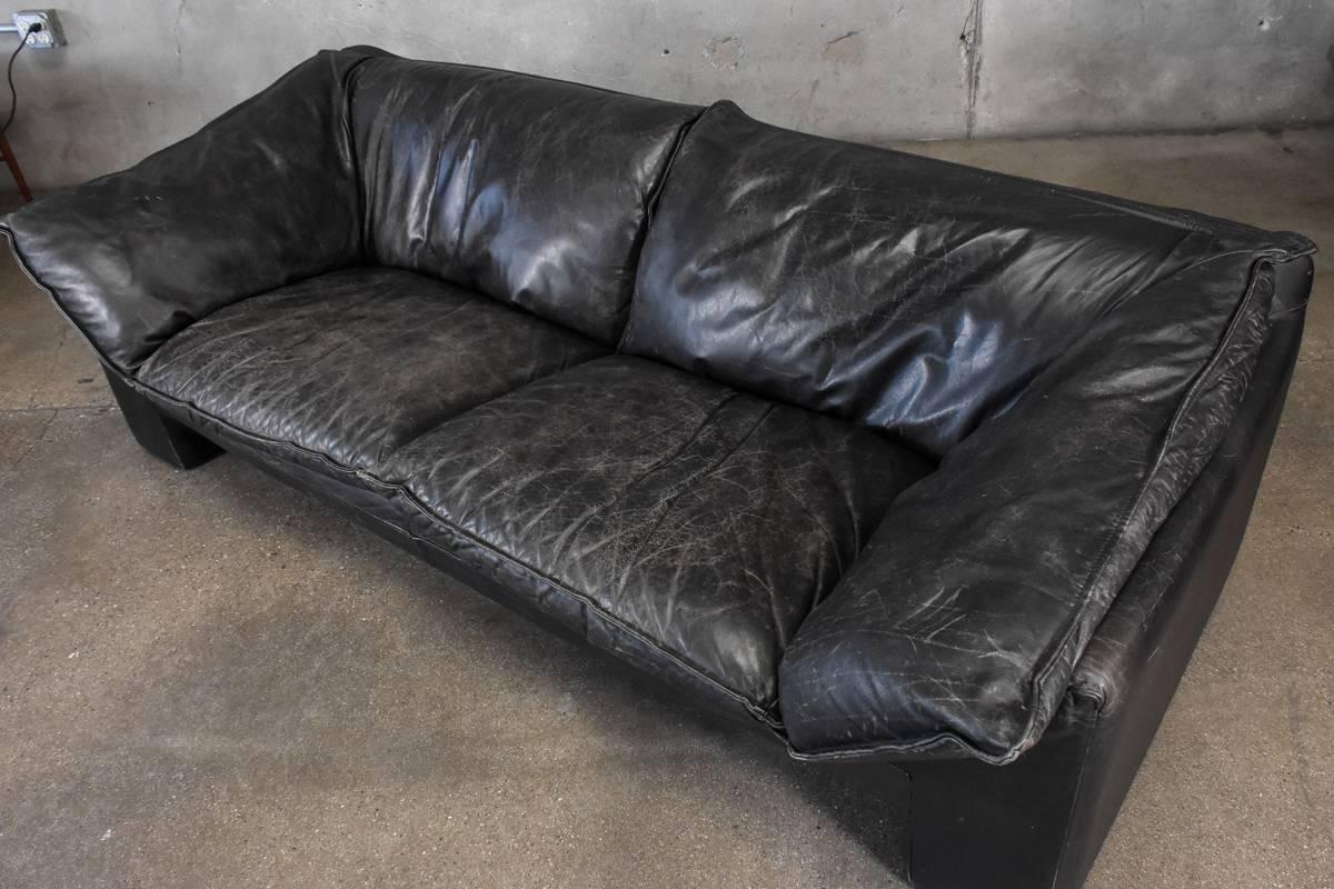 An exceptional Danish leather sofa designed by Jens Juul Eilersen for Niels Eilersen in the 1970s. The incredibly comfortable down cushions are wrapped in buffalo leather that has taken on a beautiful patina.

Measure: Seat height is 16
