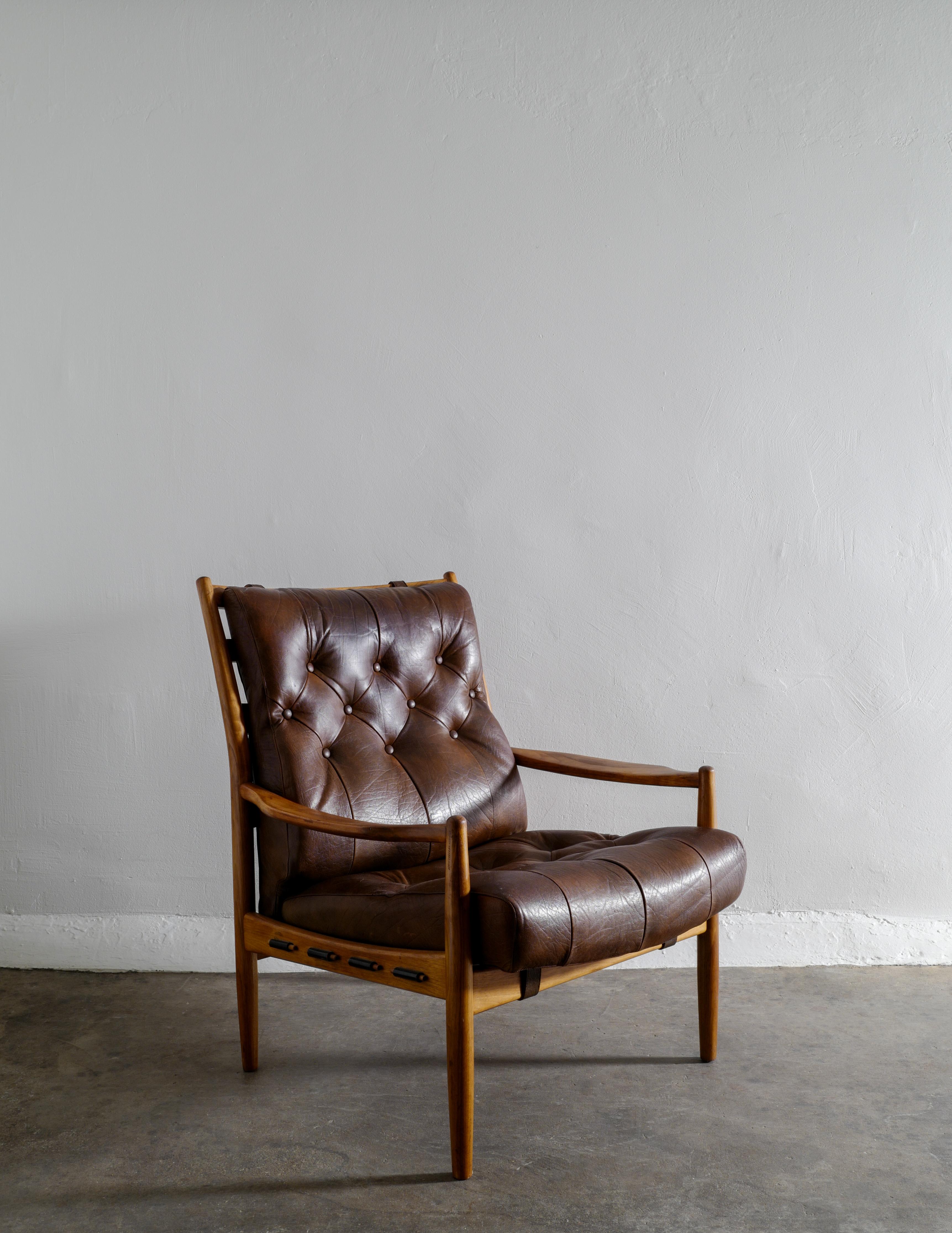 Rare armchair in buffalo leather and walnut designed by Ingemar Thillmark and produced by 