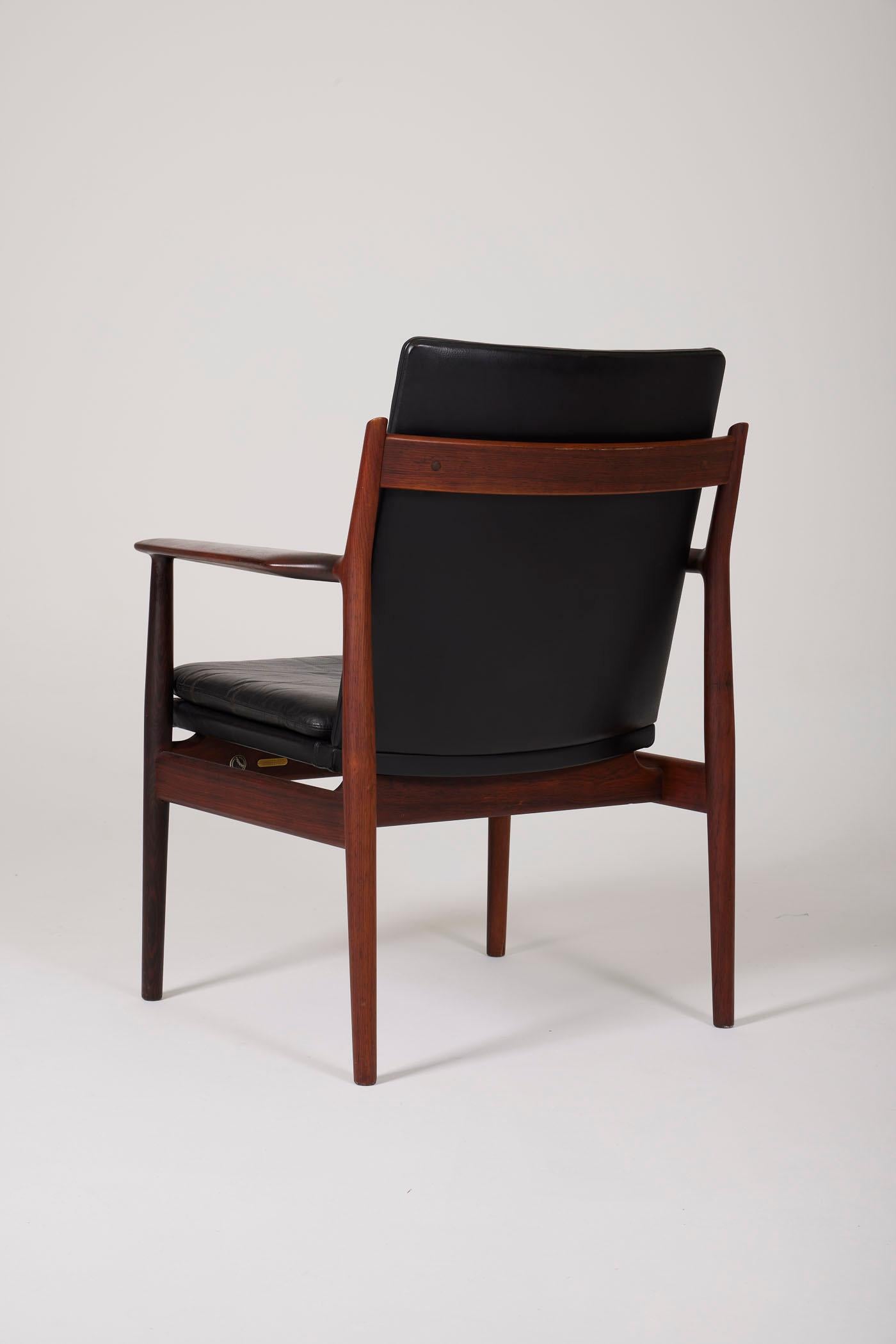 Scandinavian Modern Leather armchair by Arne Vodder For Sale
