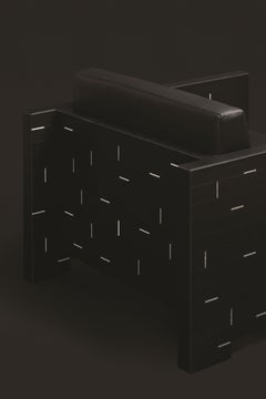 Poltrona in pelle Stephane Parmentier per Giobagnara Atari Jay Armchair