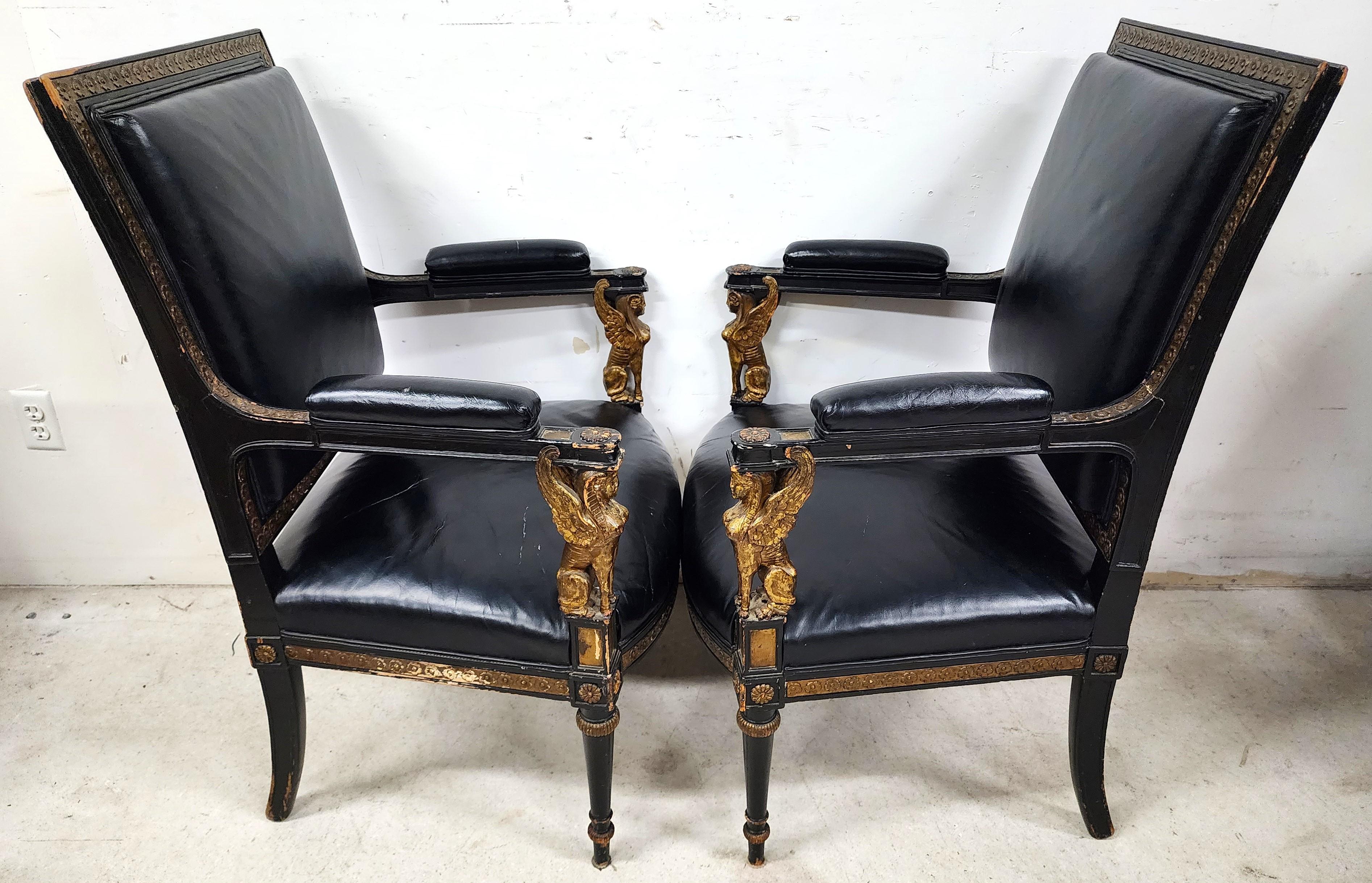 For FULL item description click on CONTINUE READING at the bottom of this page.

Offering One Of Our Recent Palm Beach Estate Fine Furniture Acquisitions Of A
Pair of Mid Century Empire Style Leather Armchairs with Sphinx Arm