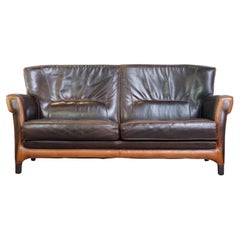 Divano in pelle dal design Art Nouveau, 2,5 posti, caratterizzato da splendidi colori caldi