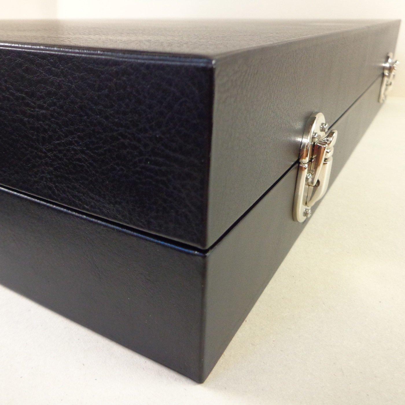 The exterior of the custom wooden box, which houses the board game and all of its components, has been wrapped in vegetable-tanned Tuscan calf skin. The piece is also reinforced with acid-free paper and cardboard. The interior contains a soft foam
