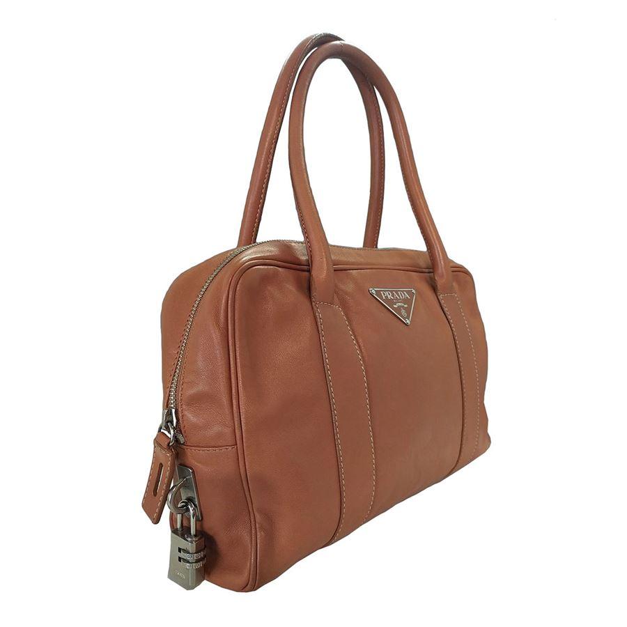 Leather Cognac color Double handle Internal zip pocket Zip closure with padlock Cm 29 x 20 x 5 (1141x 787 x 196 inches) Presence of few spots on the corners see pictures Original price euro 1300
