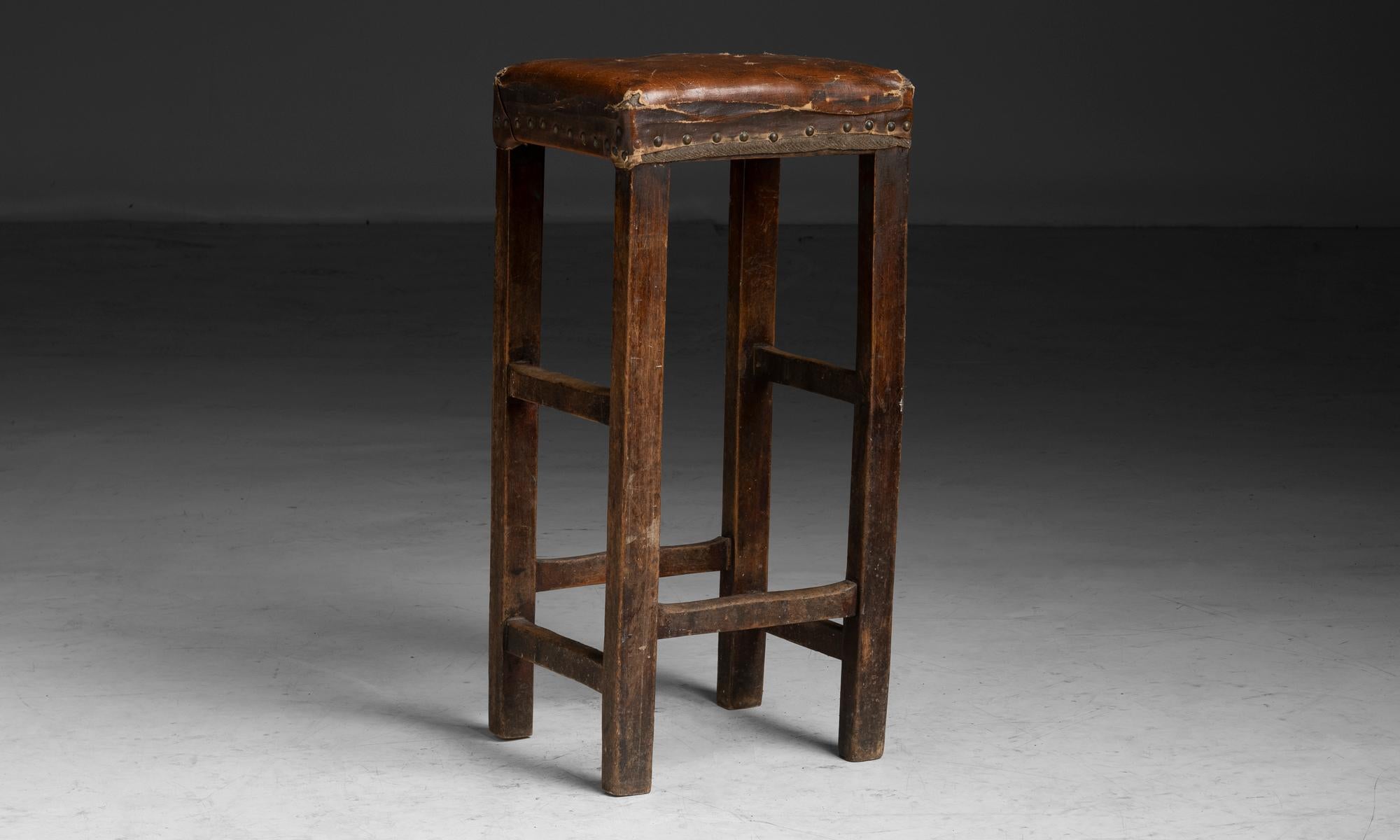 Leather Bar Stool
England circa 1890
Original studded leather seat on weathered pine wood frame.
14.5