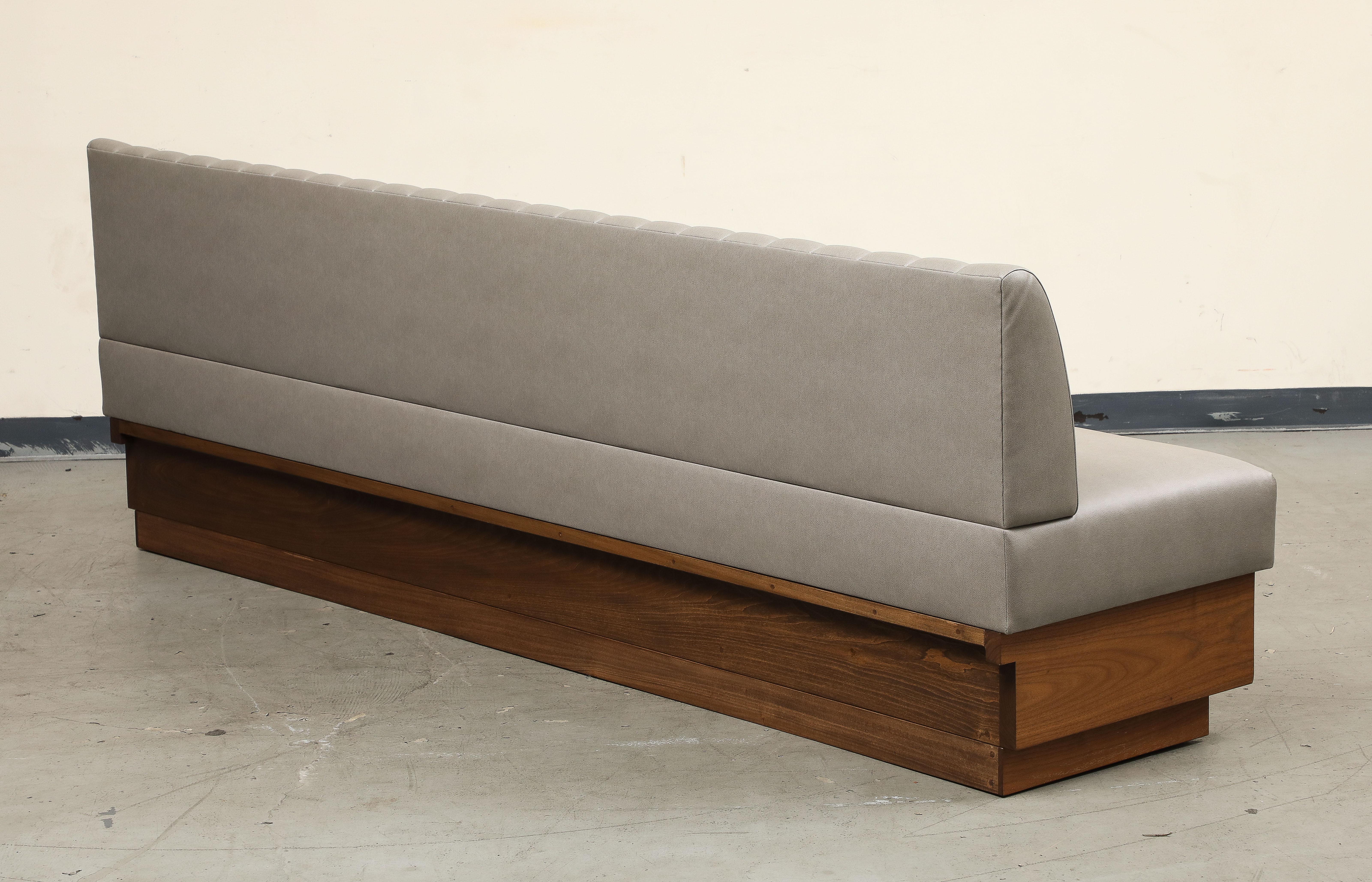 Contemporary Leather Barrel Tufted Banquette on Walnut Base by ROOM