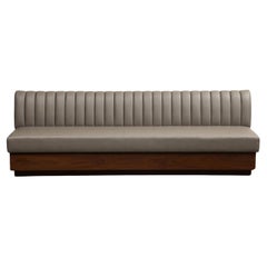 Leather Barrel Tufted Banquette on Walnut Base by ROOM