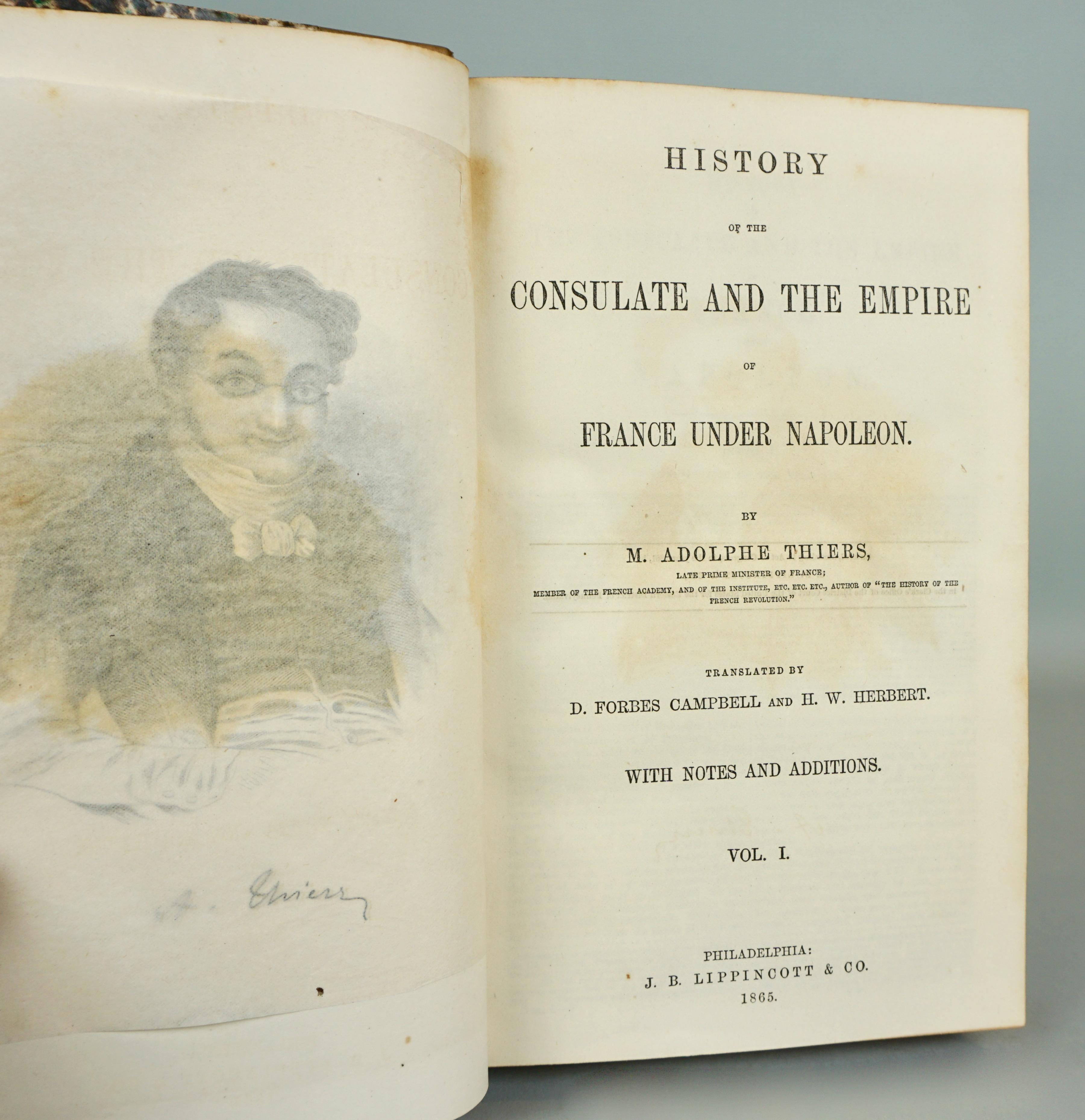 A 5 volume history of the French Consulate and Empire under Napoleon written by famous historian and later French President Adolphe Thiers, in 3/4 brown leather bound volumes with raised gilt tooled spines, marbleized endpapers and boards and