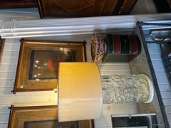 Leather-bound wastepaper basket in the form of a book binding