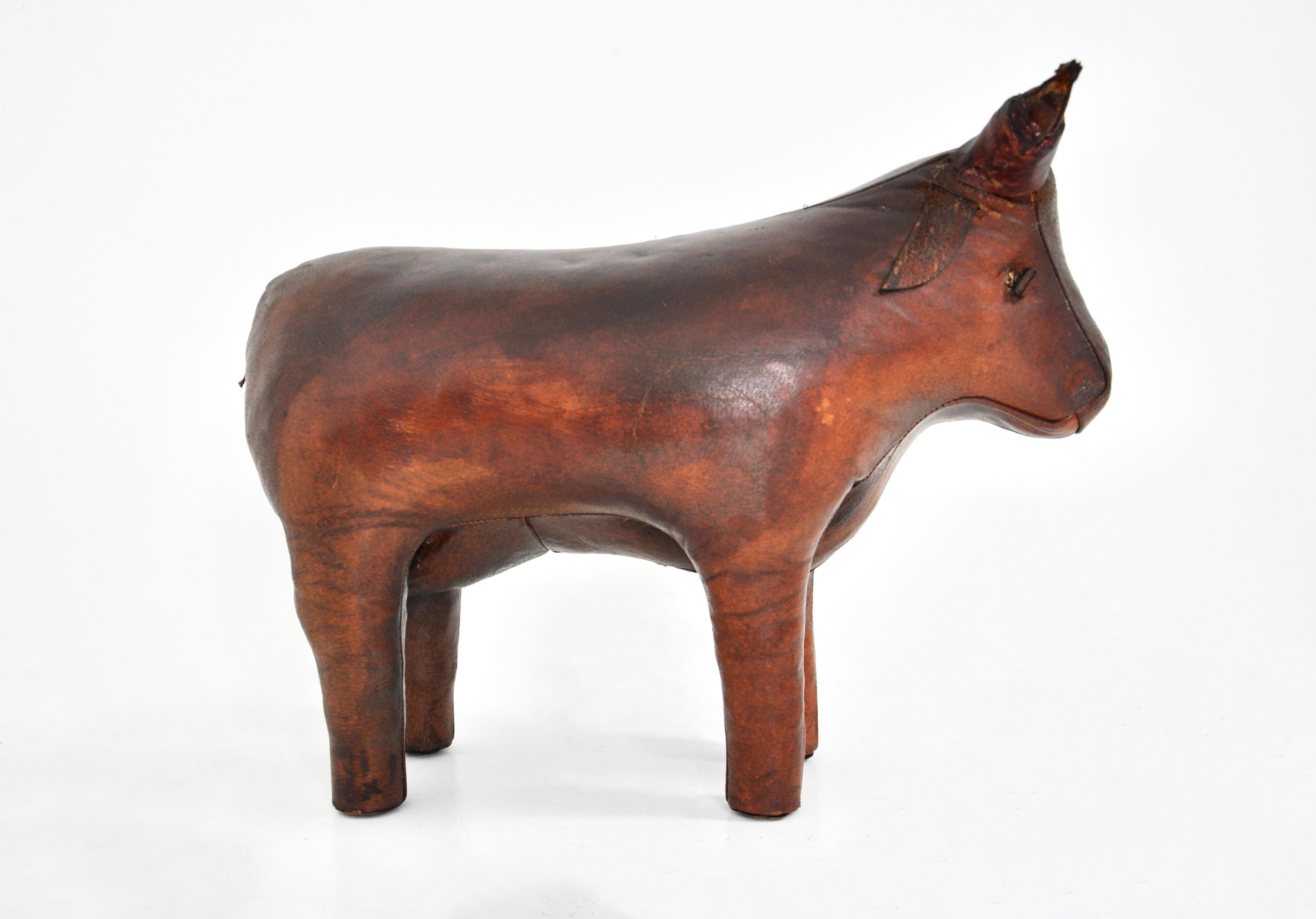 Bull-shaped leather stool designed by Dimitri Omersa. The ears have been restored. Wear due to time and age 
FOR SHIPPING, REQUEST US FOR RECEIVE THE BEST PRICE
