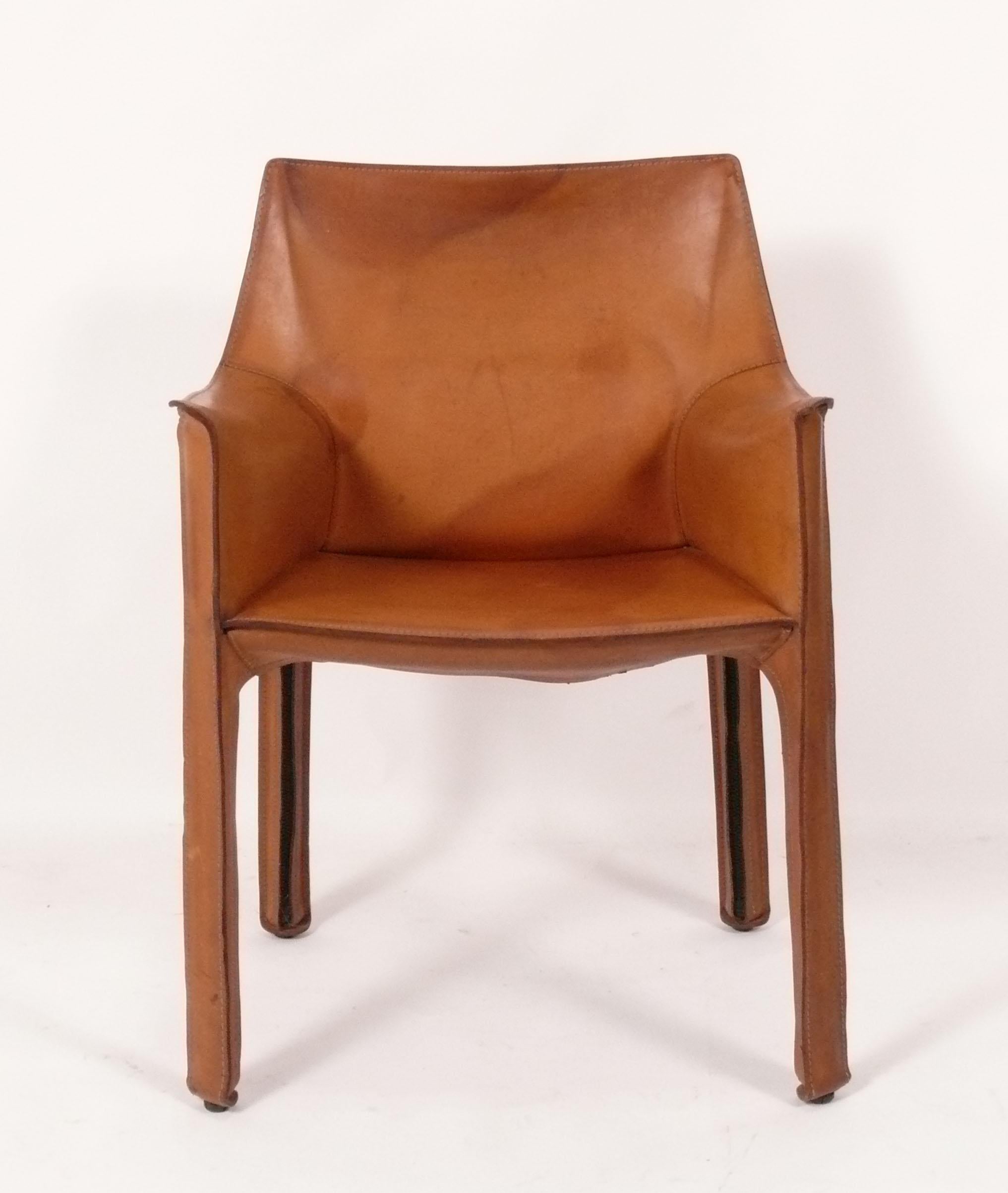 Cab chair in faded cognac color leather, designed by Mario Bellini for Cassina, circa 1980s.