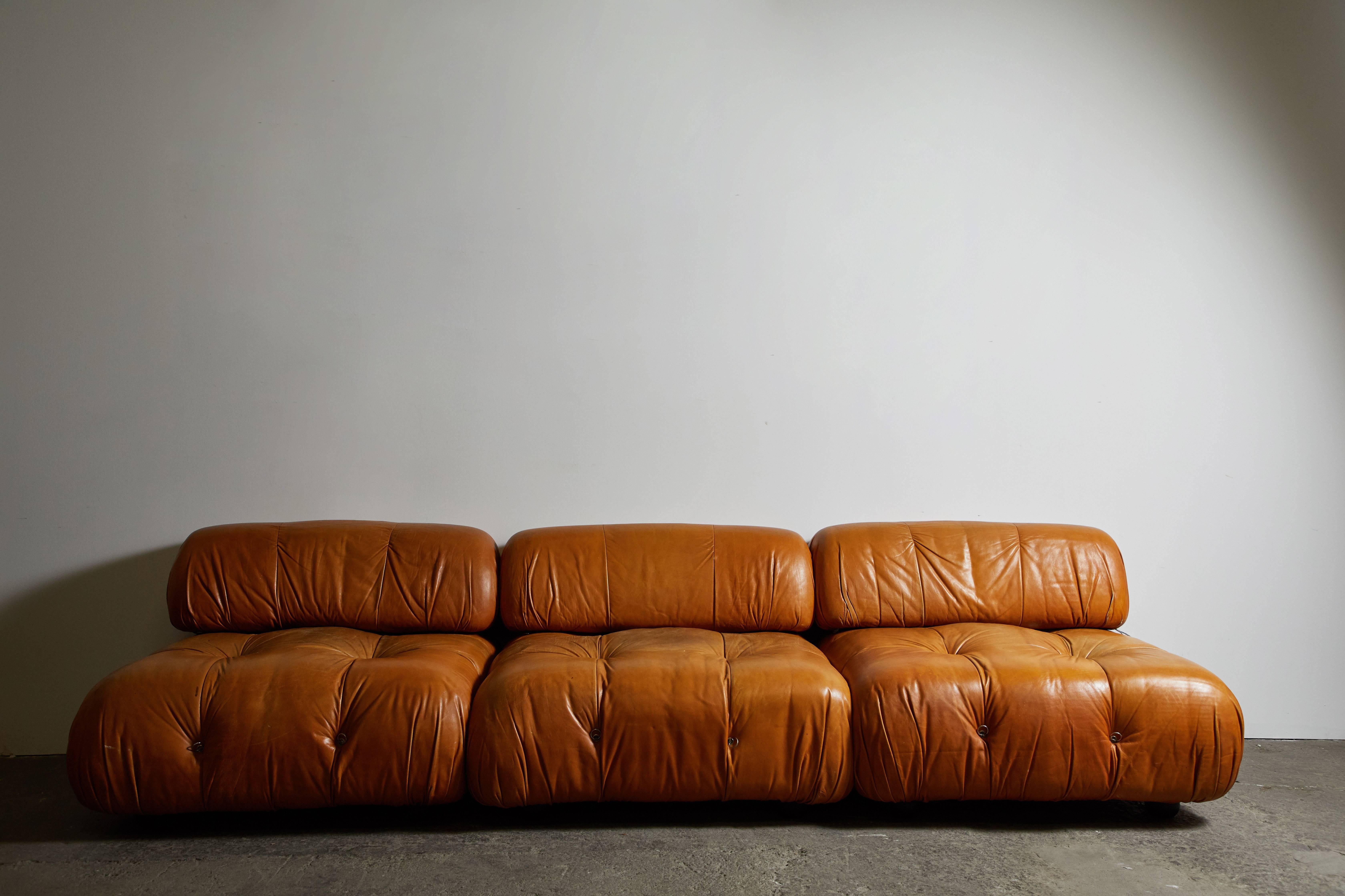 First production, original cognac leather modular Camaleonda sofa by Mario Bellini for C&B Italia. Made in Italy circa 1971. Unlimited cushion system

The sectional elements of this can be used freely and apart from one another. The backs are